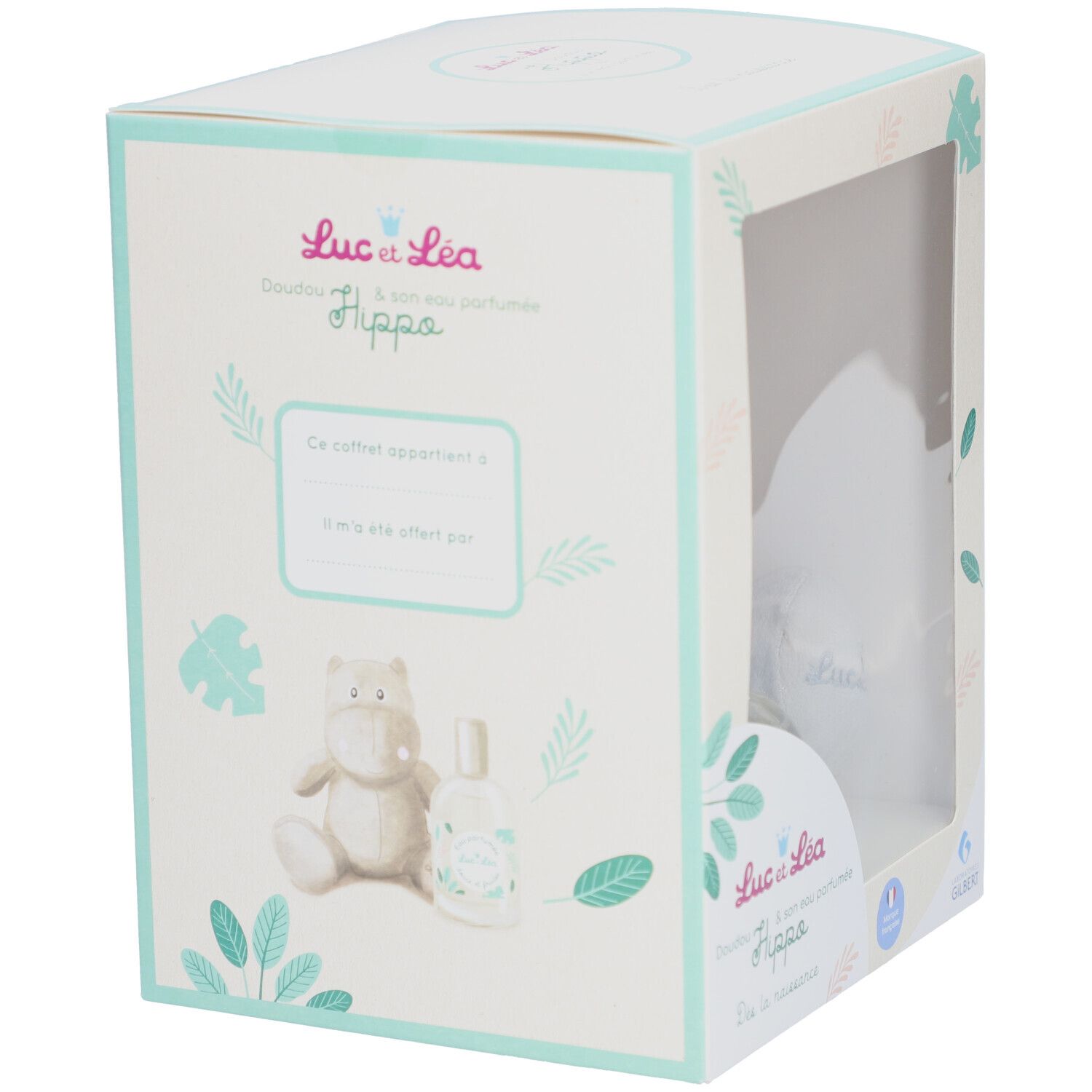 Emballage Luc & Léa. Boîte avec illustration d'hippopotame en peluche, eau parfumée et espace notes. Fenêtre.