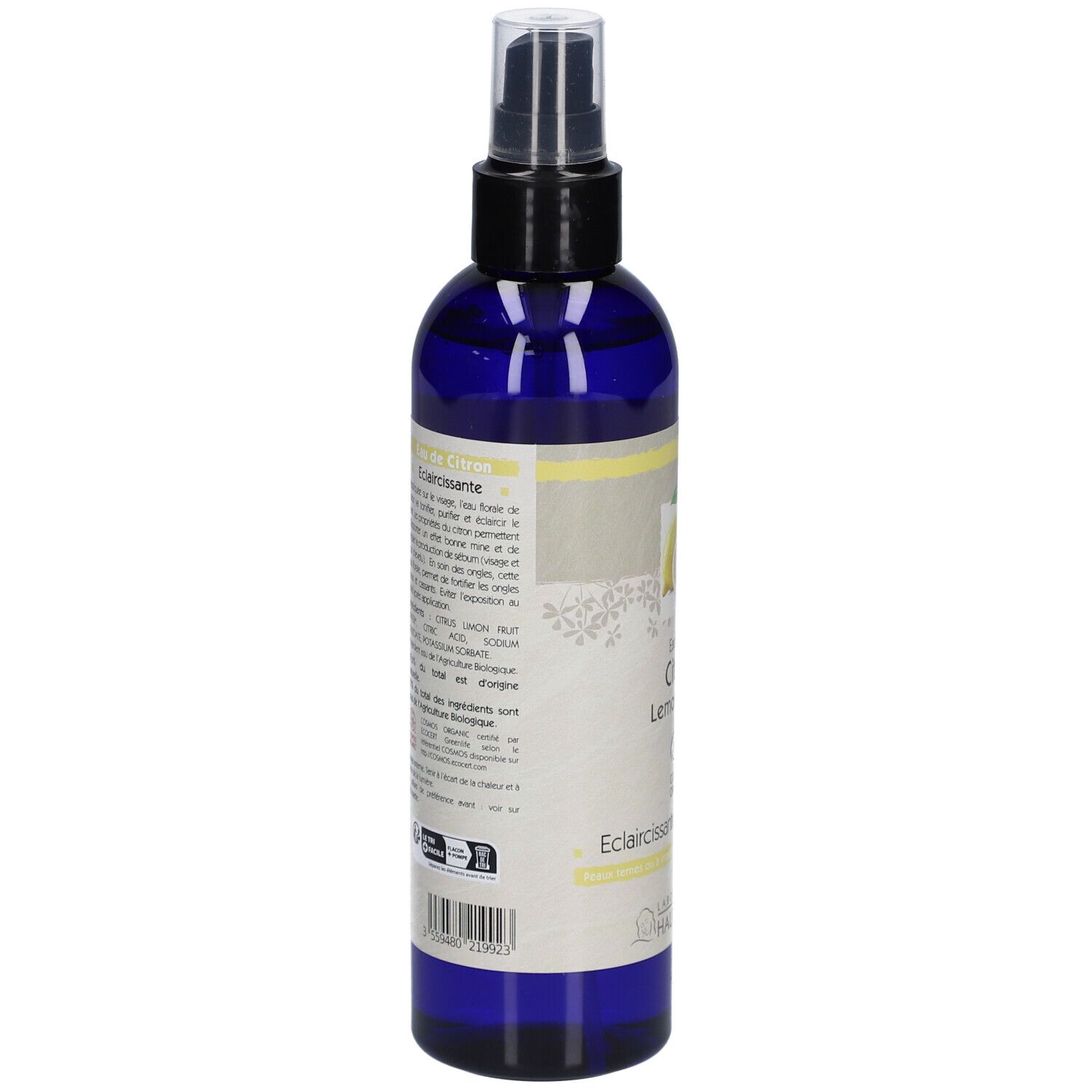 Blaue Flasche mit Zerstäuber. Aufkleber mit Zitrone, Text: Eau florale Citron, Lemon water, Eclaircissante/Lightening, Bio.