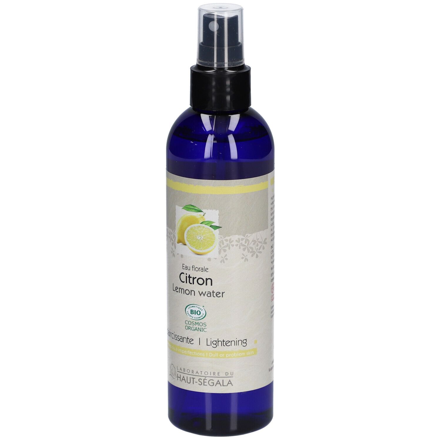 Blaue Flasche mit Zerstäuber. Aufkleber mit Zitrone, Text: Eau florale Citron, Lemon water, Eclaircissante/Lightening, Bio.