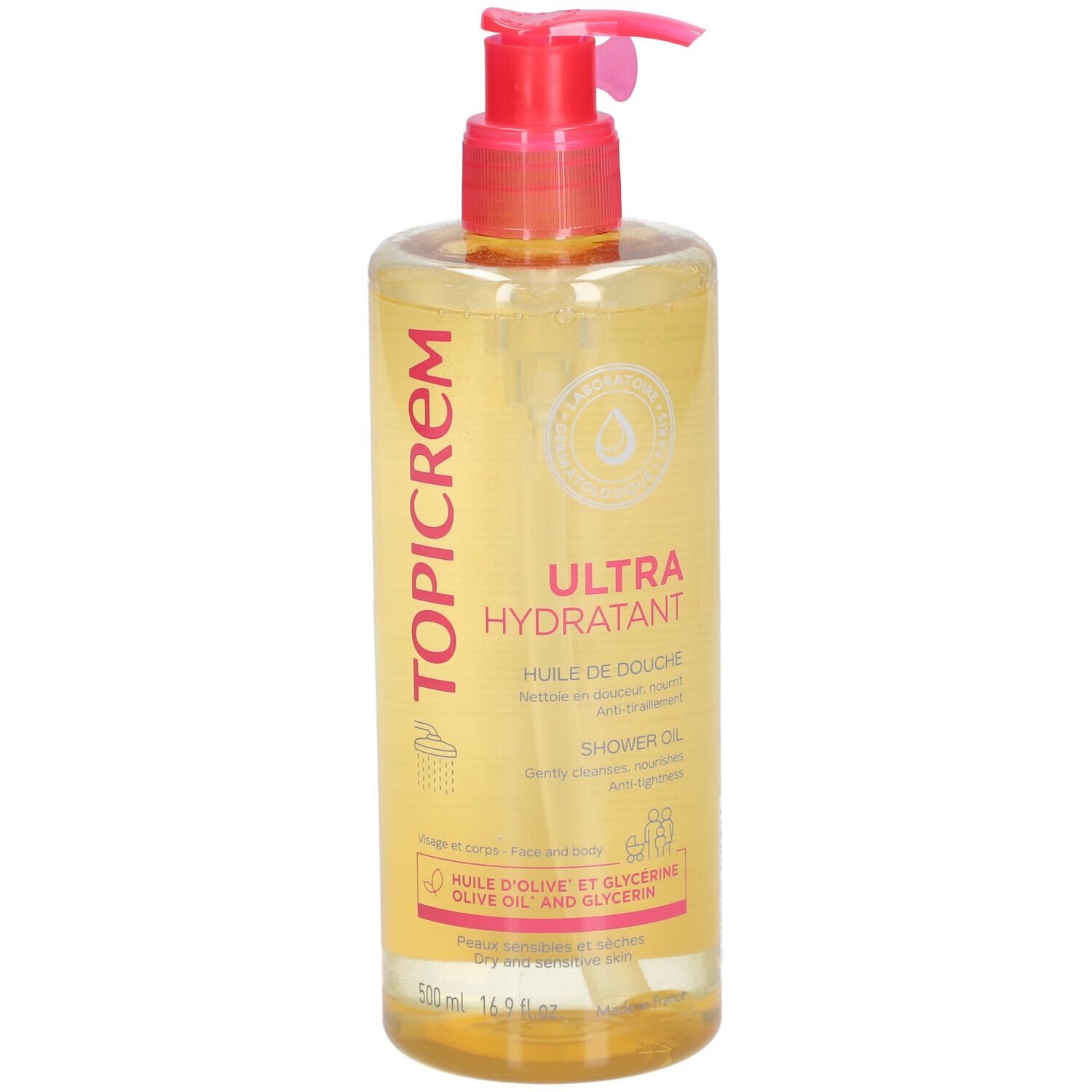 Flacon transparent avec pompe rose. Inscription : TOPICREM, ULTRA HYDRATANT, HUILE DE DOUCHE. Pour peaux sèches.