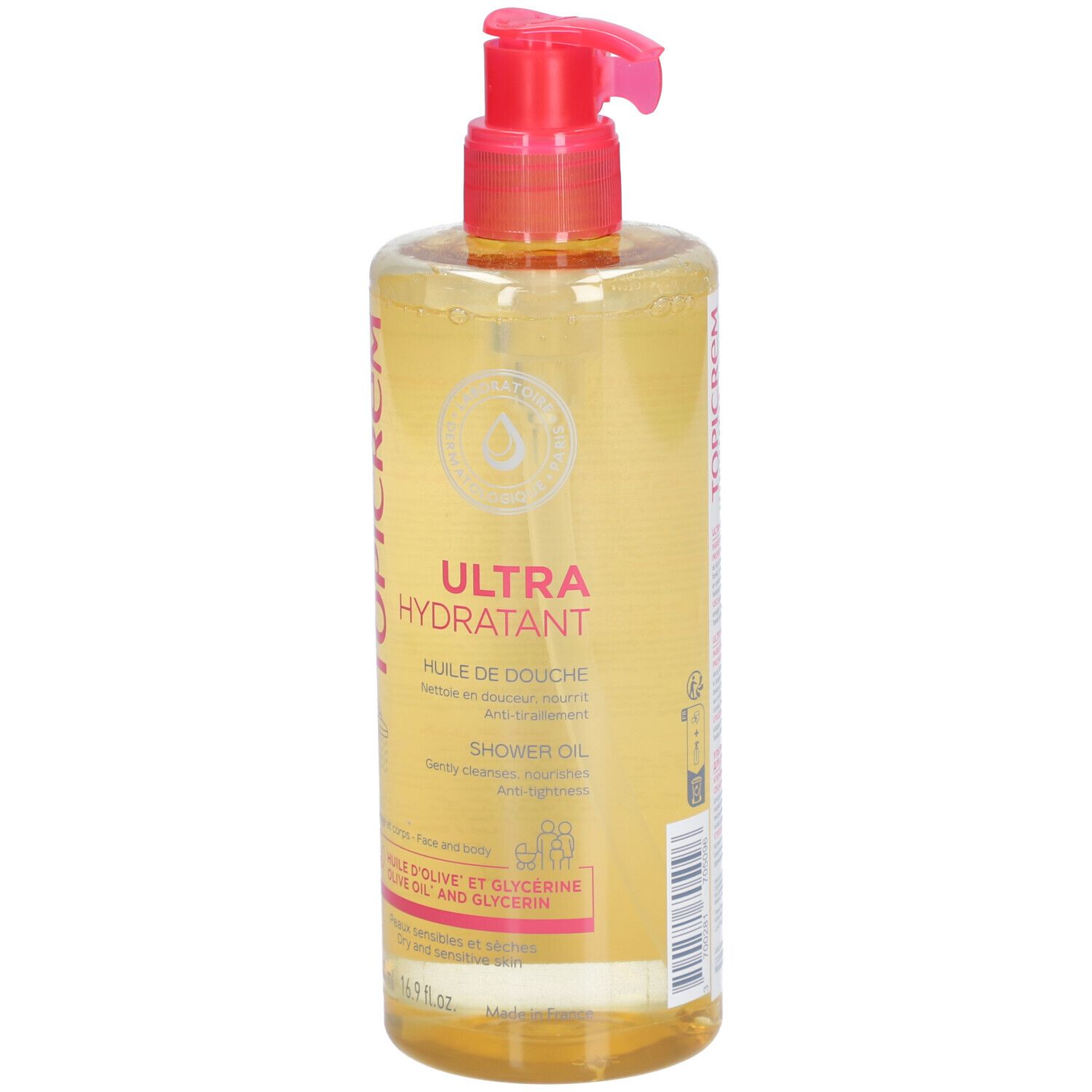 Flacon transparent avec pompe rose. Inscription : TOPICREM, ULTRA HYDRATANT, HUILE DE DOUCHE. Pour peaux sèches.