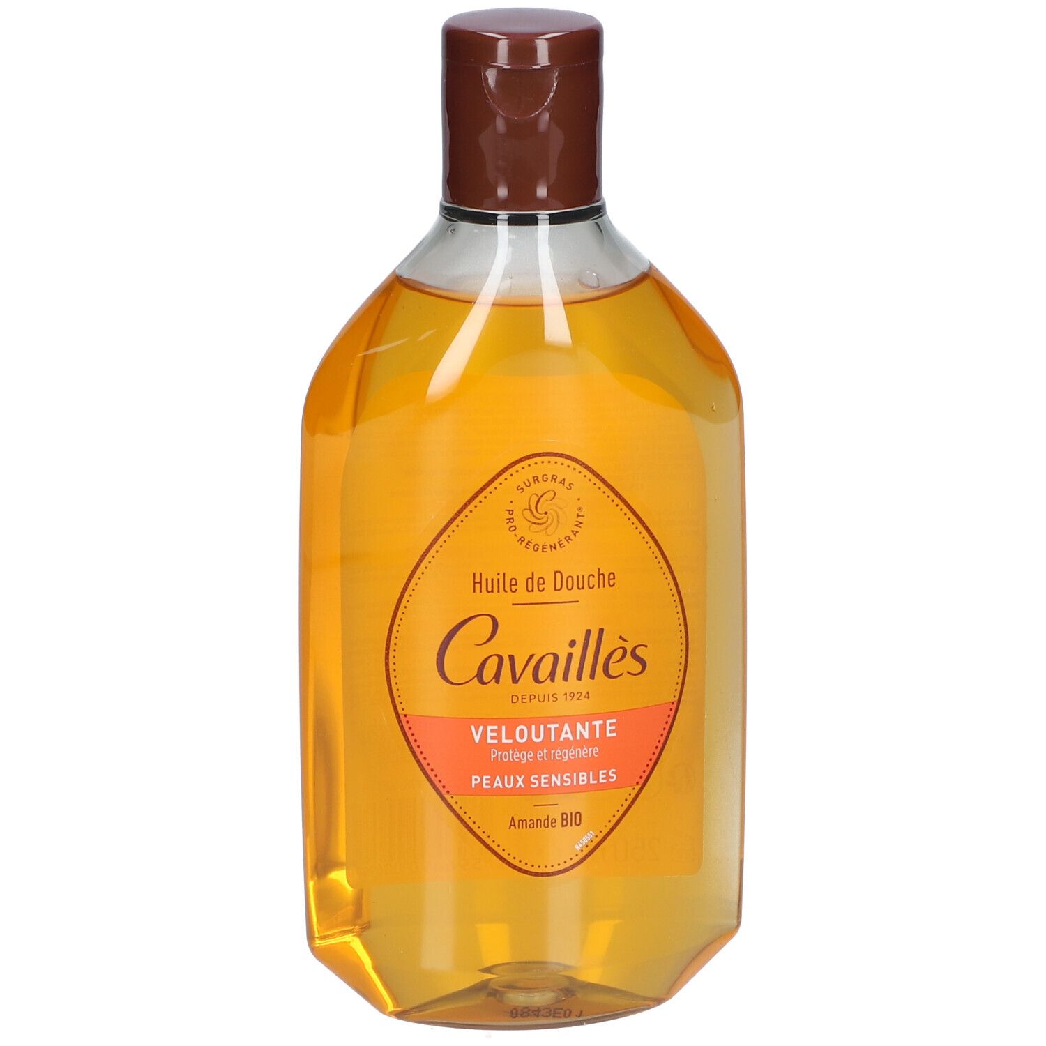 Doucheolie in transparante fles met bruine dop. Etiket met productinformatie.