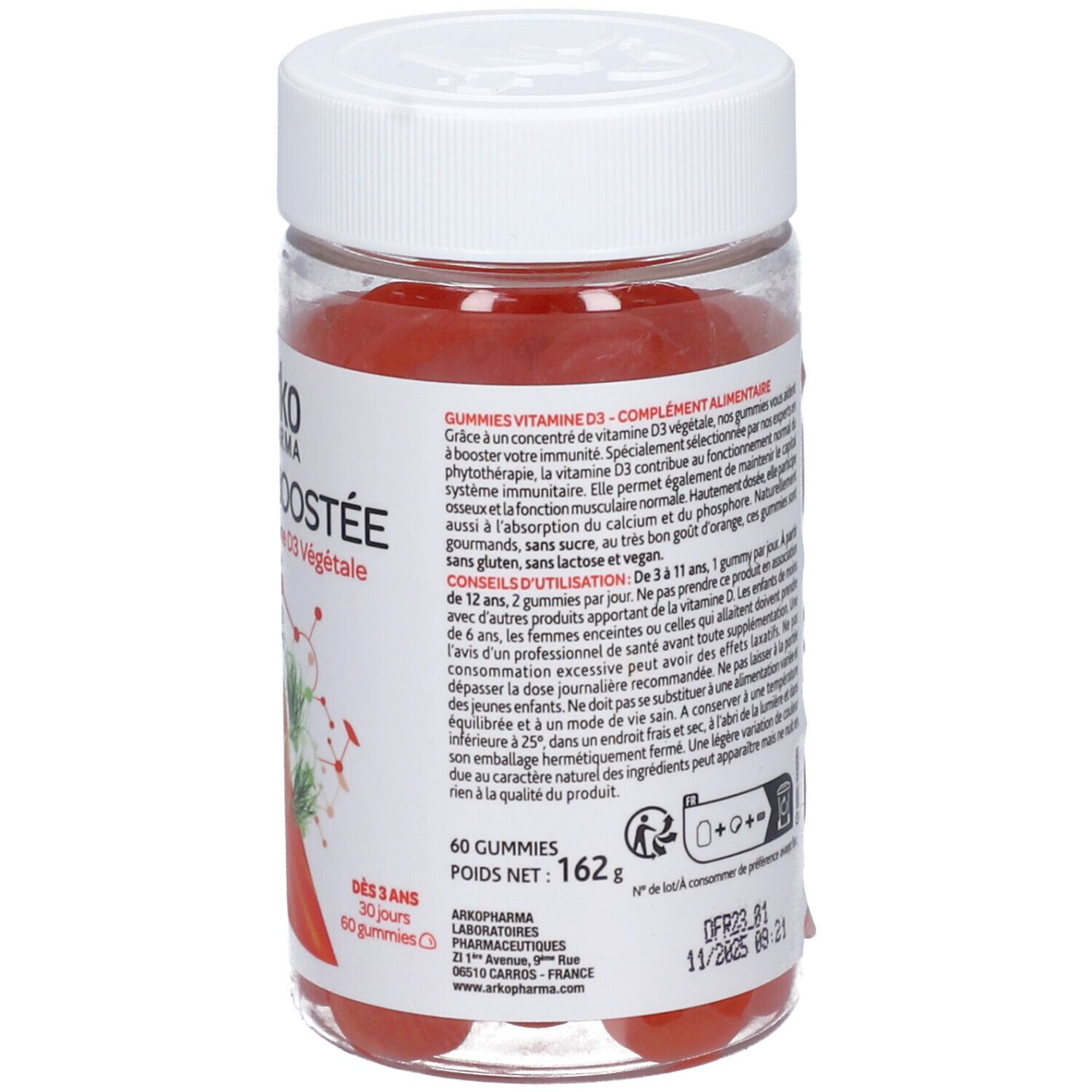 Boîte plastique transparente avec bonbons gélifiés rouges. Étiquette "Arko Pharma IMMUNITÉ BOOSTÉE" et illustrations. Couvercle blanc.