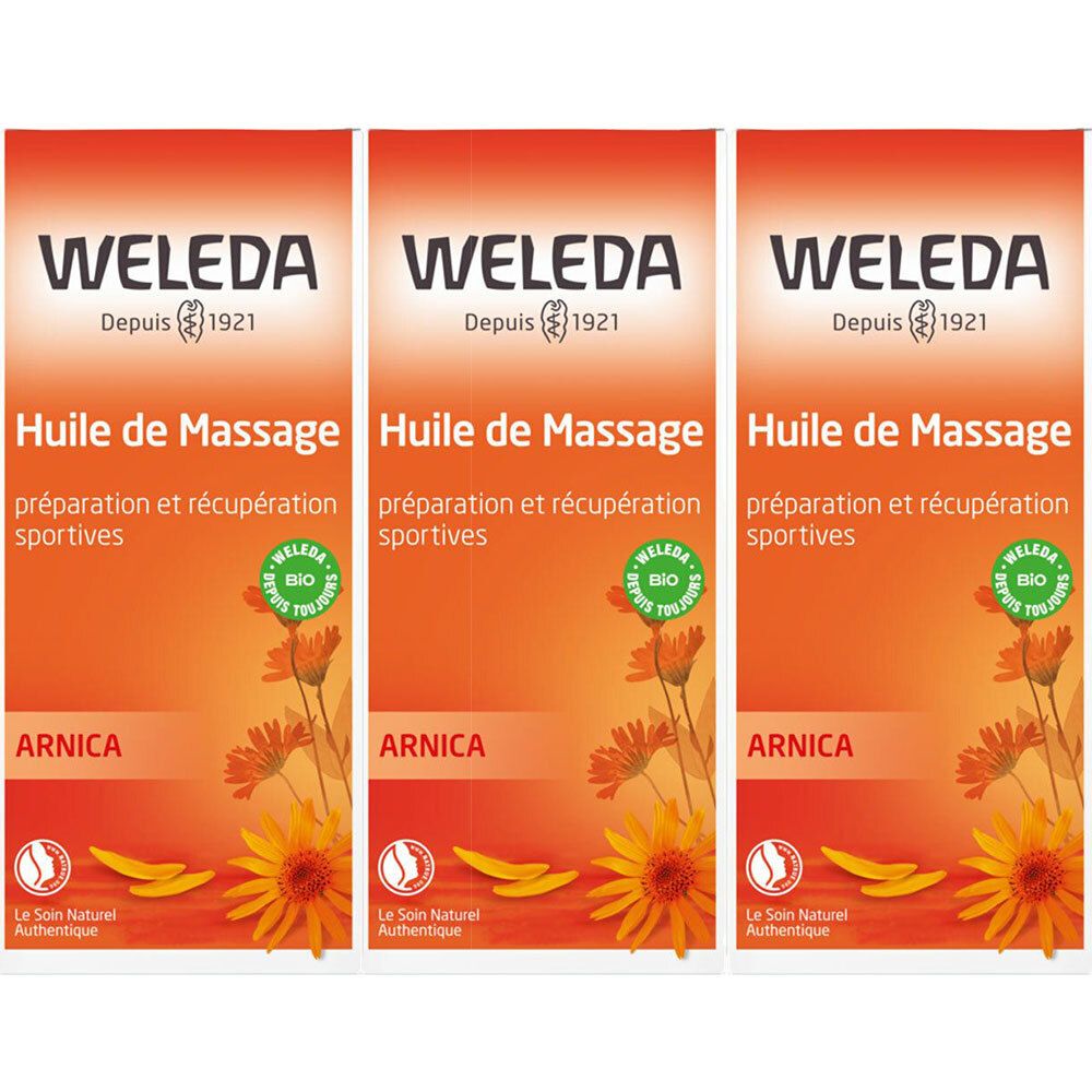Trois emballages orange. Inscription : Weleda, Huile de Massage, Arnica. Label bio et illustration florale.