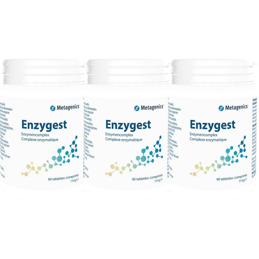 Trois pots blancs avec le nom du produit Enzygest. Chaque pot porte la marque "Metagenics". Les pots contiennent 90 comprimés.