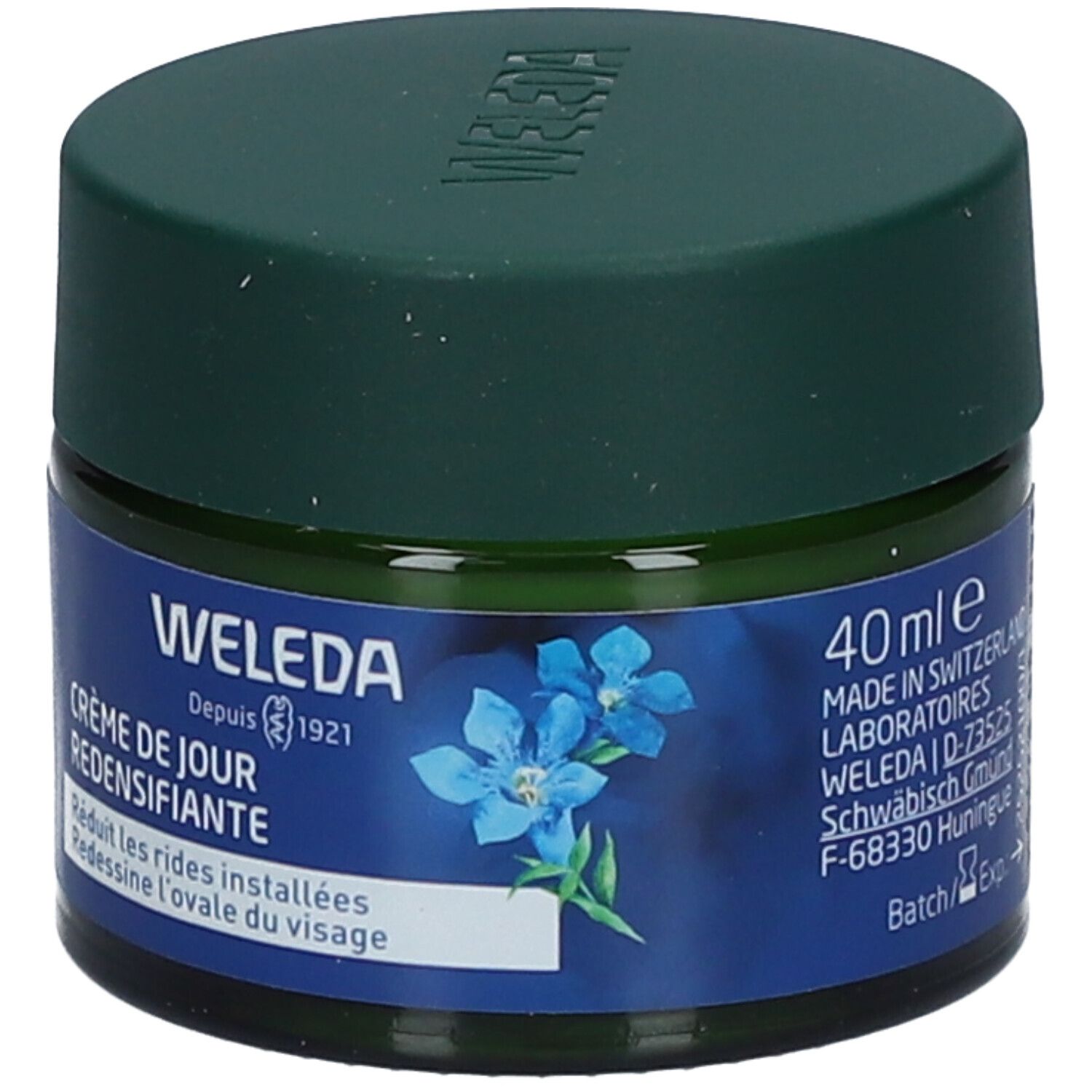 Pot en verre vert avec étiquette bleue. Inscription WELEDA Crème de Jour redensifiante. 40 ml. Vue du produit.