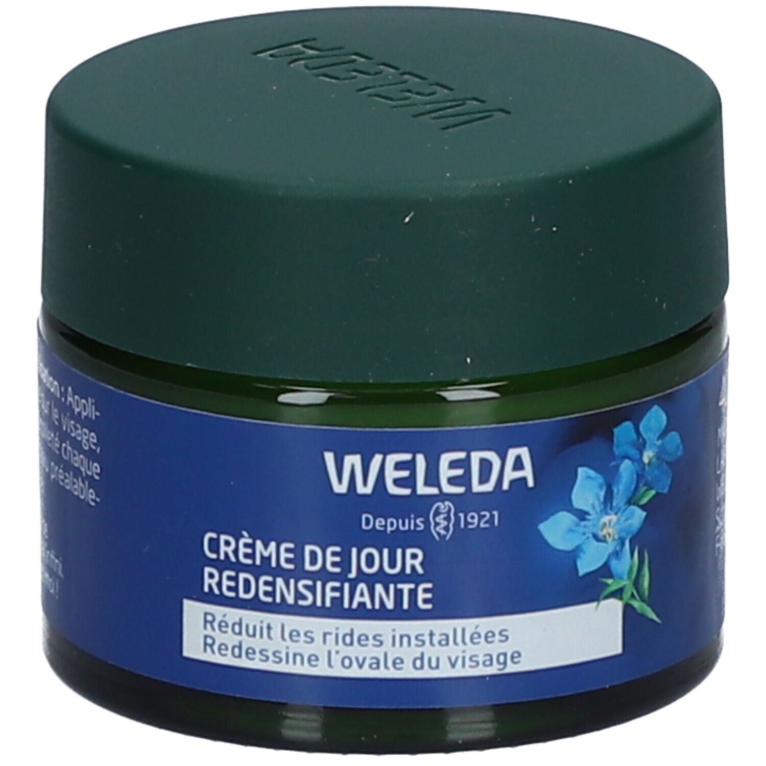 Pot en verre vert avec étiquette bleue. Inscription WELEDA Crème de Jour redensifiante. 40 ml. Gros plan.