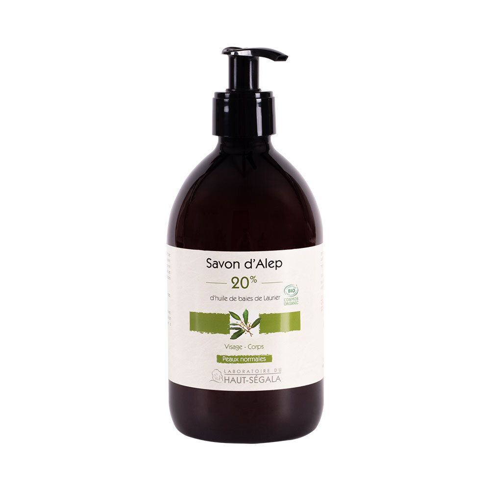 Flacon brun avec pompe noire. Étiquette avec texte: Savon d'Alep 20%, d'huile de baies de Laurier. Label bio.