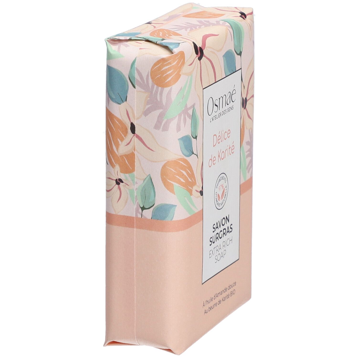 Seife, schräg von der Seite. Florales Design. Aufschrift: Osmaé, Délice de Karité, Savon Surgras, Extra Rich Soap. Vegan-Siegel.