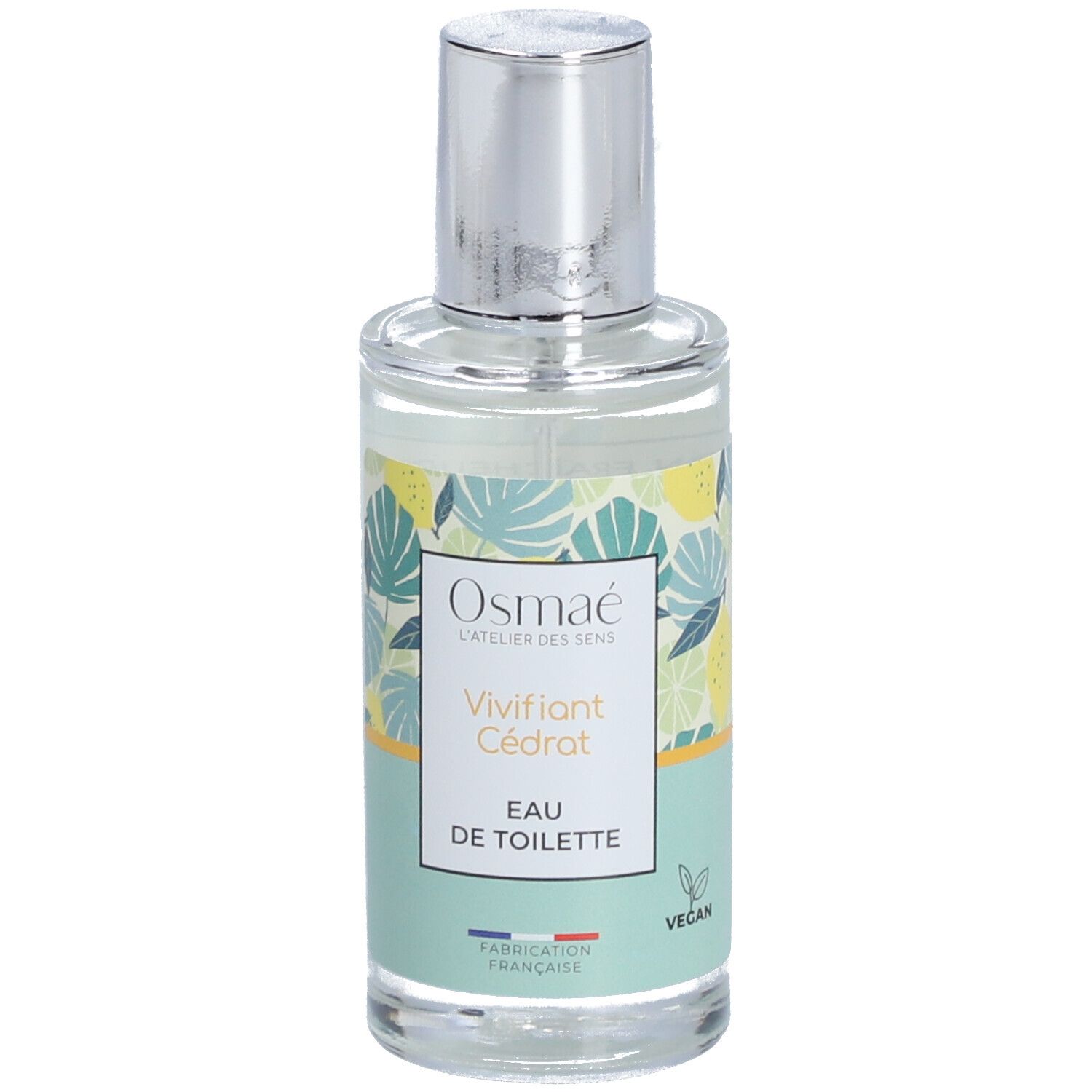 Flacon en verre avec vaporisateur argenté. Inscription: Osmaé, Vivifiant Cédrat, Eau de Toilette. Motif vert et jaune. Label Vegan.