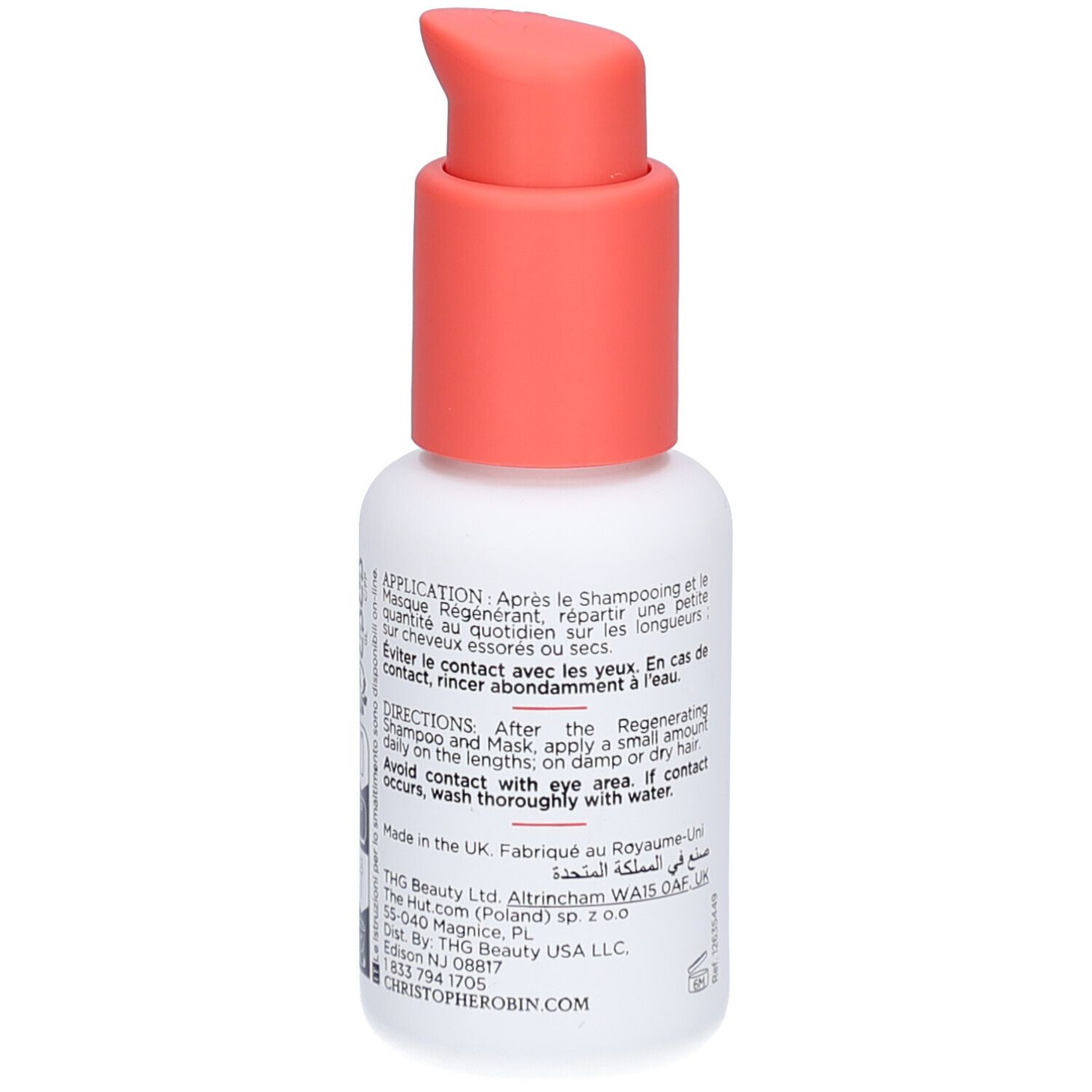 Rückseite des weißen Fläschchens mit rotem Pumpkopf. Text in mehreren Sprachen, darunter Englisch und Arabisch.