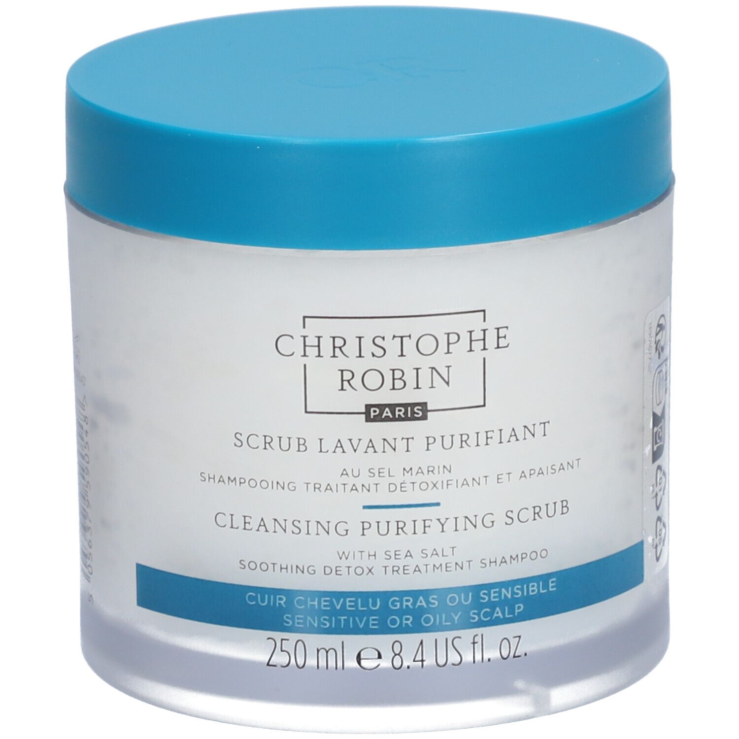 Pot rond bleu et blanc. Inscriptions: CHRISTOPHE ROBIN PARIS, Scrub lavant purifiant, et autres informations.