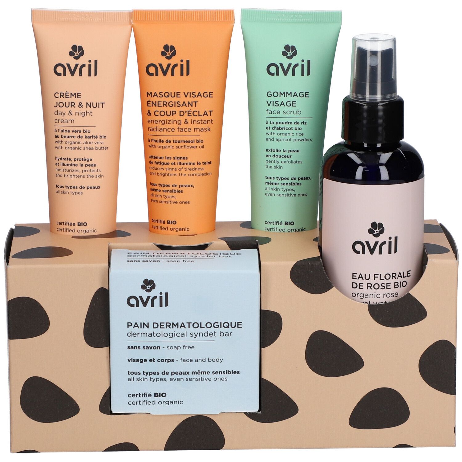 Geschenkset met cosmetica. Tubes, fles en zeep in een doos met zwarte vlekken. Bio-certificering.