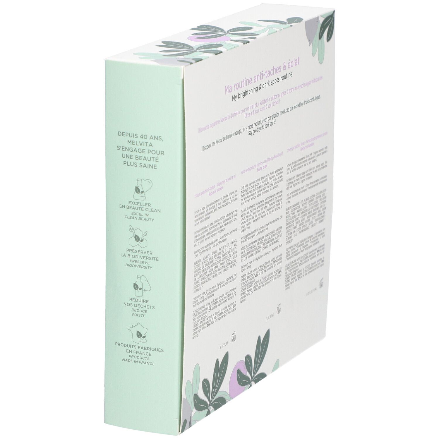Coffret cadeau, vue en biais. Texte : Ma routine anti-taches & éclat. Logo. Texte en plusieurs langues.