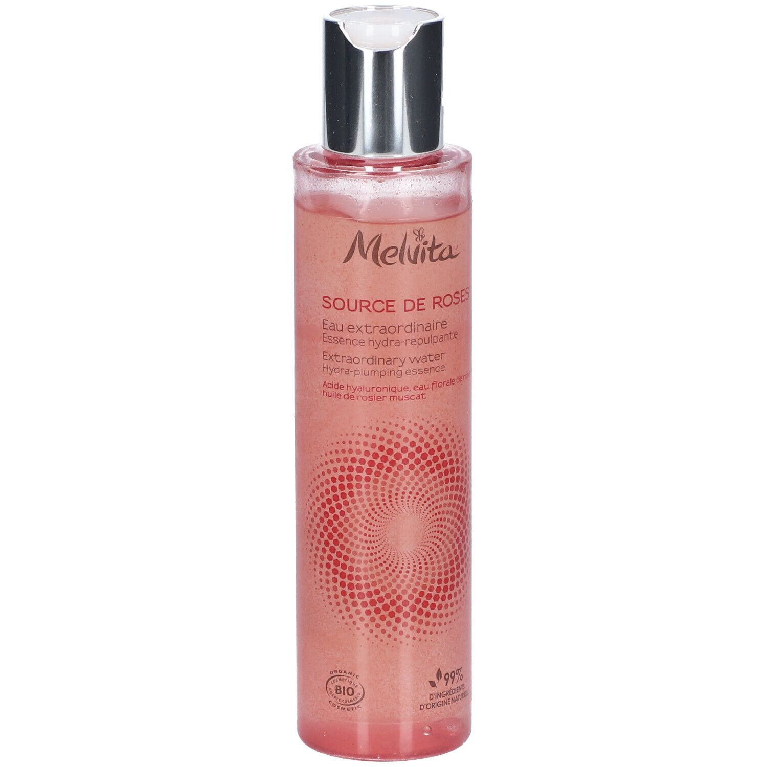 Flacon transparent, liquide rose. Bouchon argenté. Inscription: Melvita Source de Roses Eau Extraordinaire.