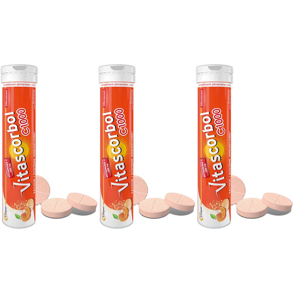 Trois tubes de VITASCORBOL C 1000. Tubes oranges avec comprimés à côté. Nom du produit et indication vitamine C clairement visibles.