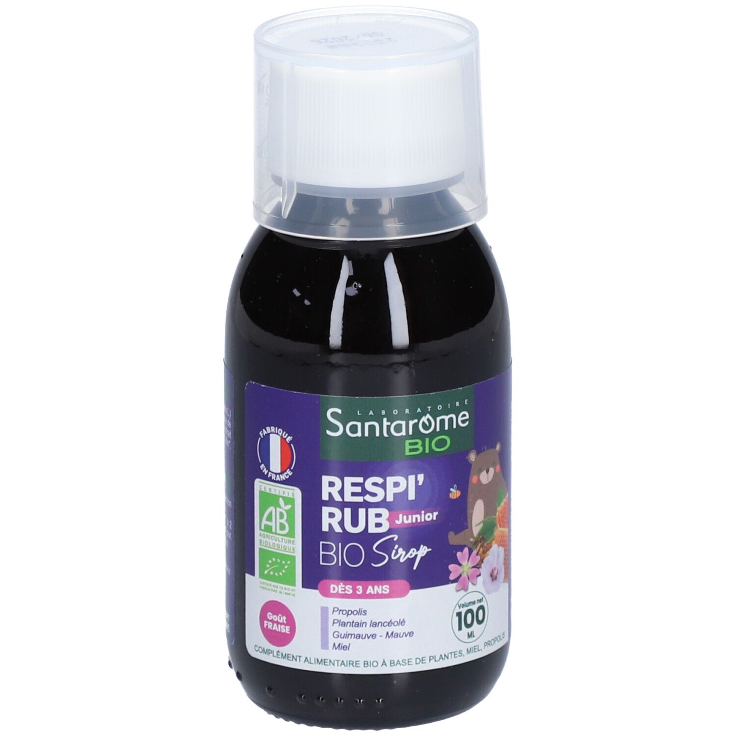 Bouteille de liquide brun. Étiquette avec nom du produit, logo, ingrédients et volume.