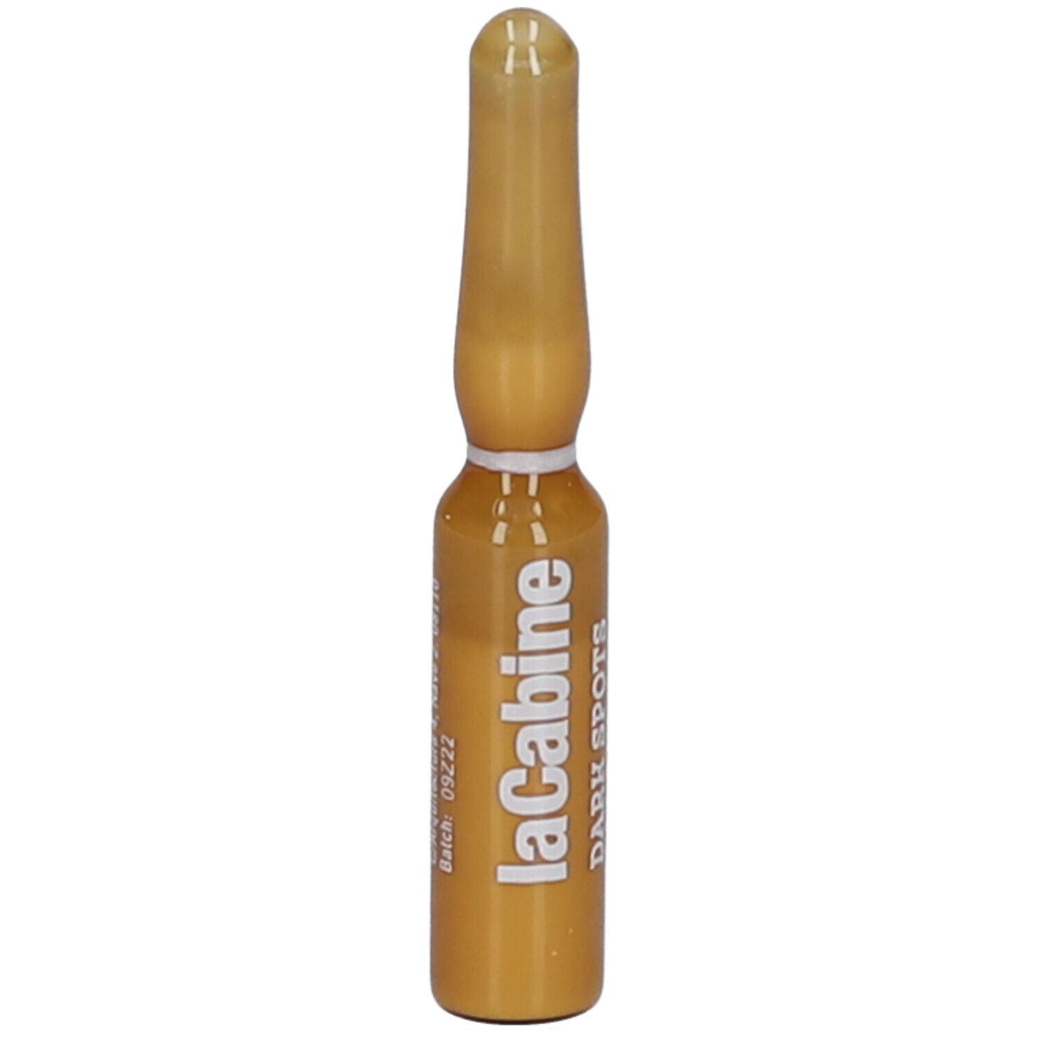 Ampoule dorée avec l'inscription "laCabine" et "DARK SPOTS".