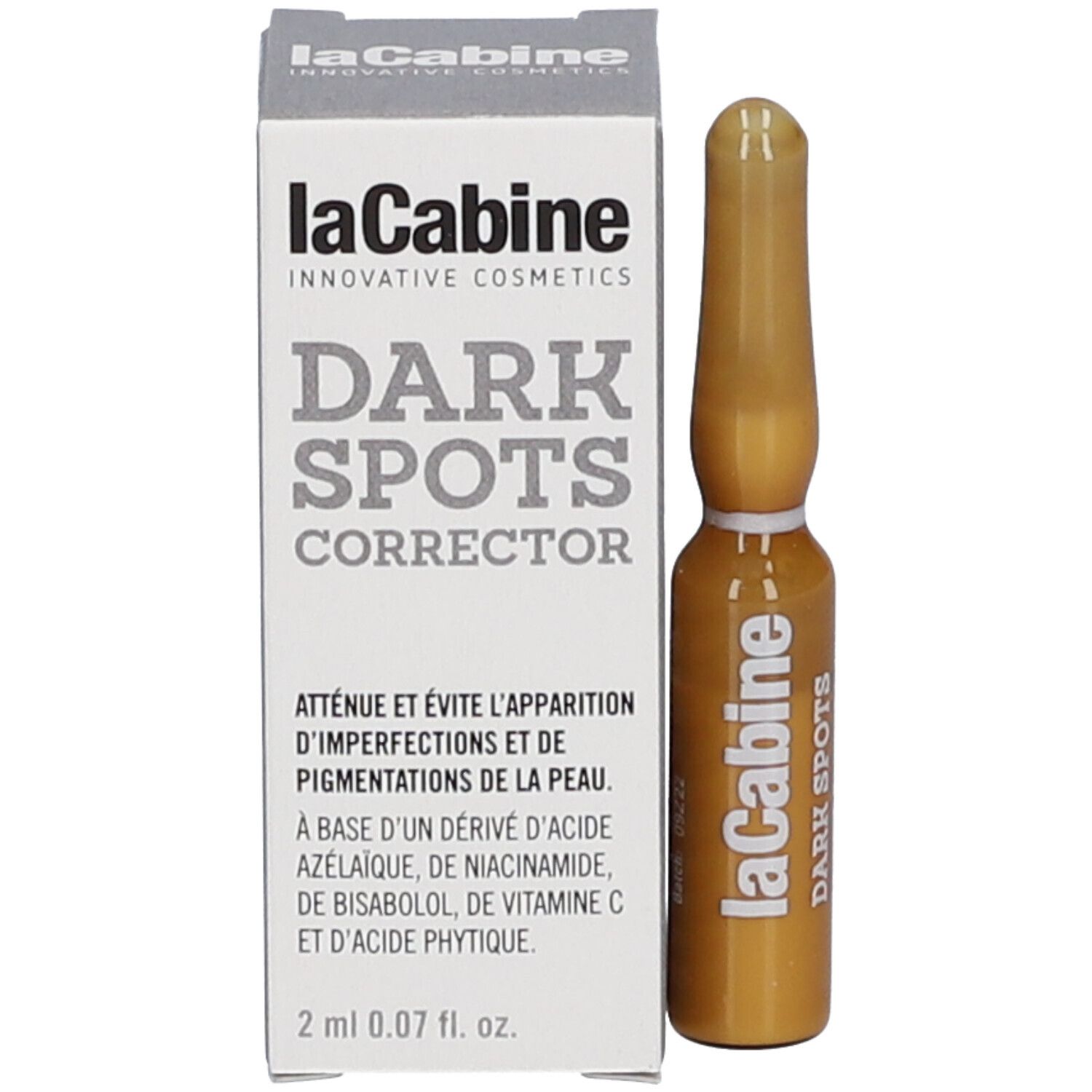Emballage du produit avec ampoule. Inscription: "laCabine DARK SPOTS CORRECTOR".