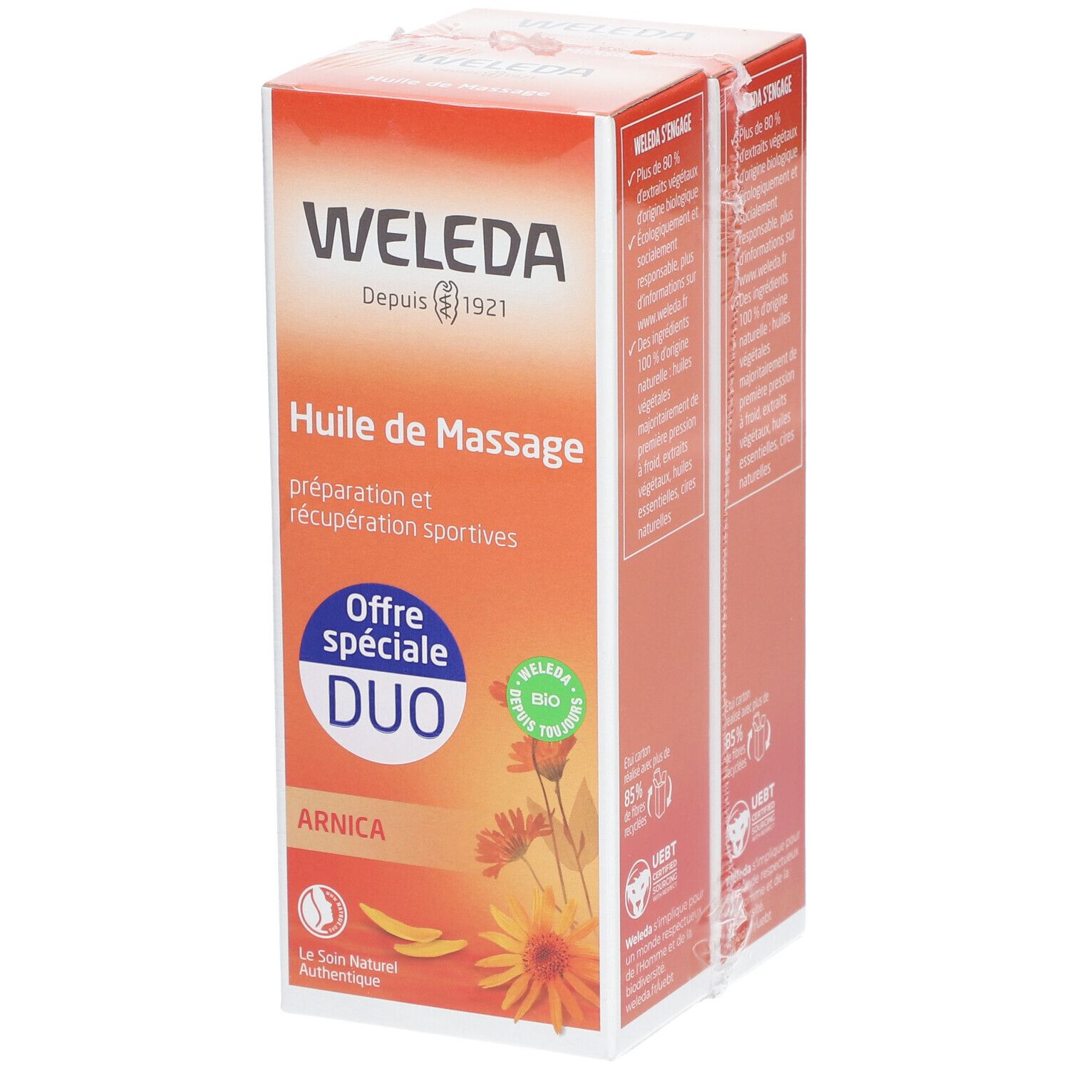 Zwei Packungen WELEDA Arnika-Massageöl DUO. Orangefarbene Verpackung mit Produktnamen und Logo. Bio-Siegel.