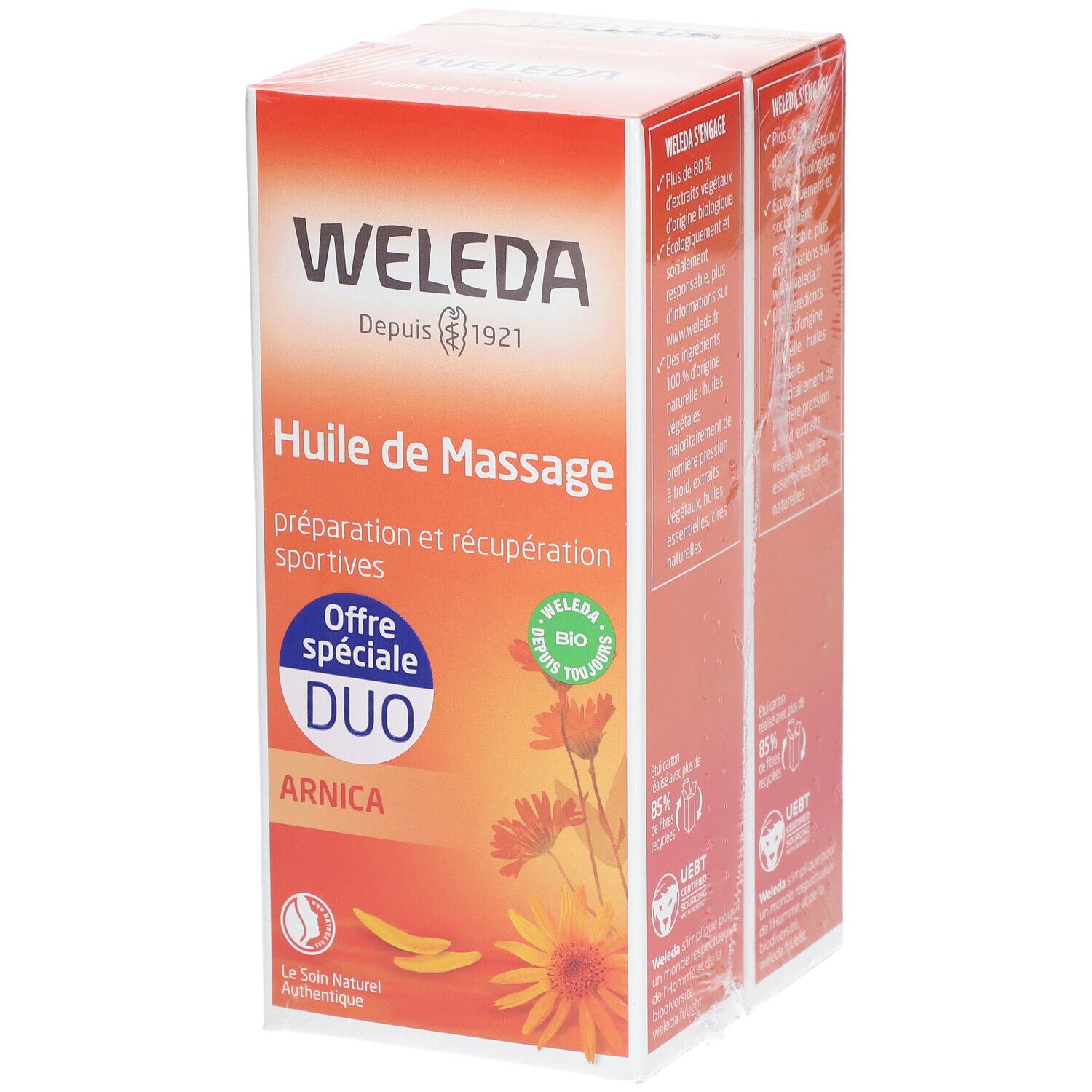 Deux boîtes de WELEDA Huile de Massage à l'Arnica DUO. Emballage orange avec nom du produit, logo et certifications.