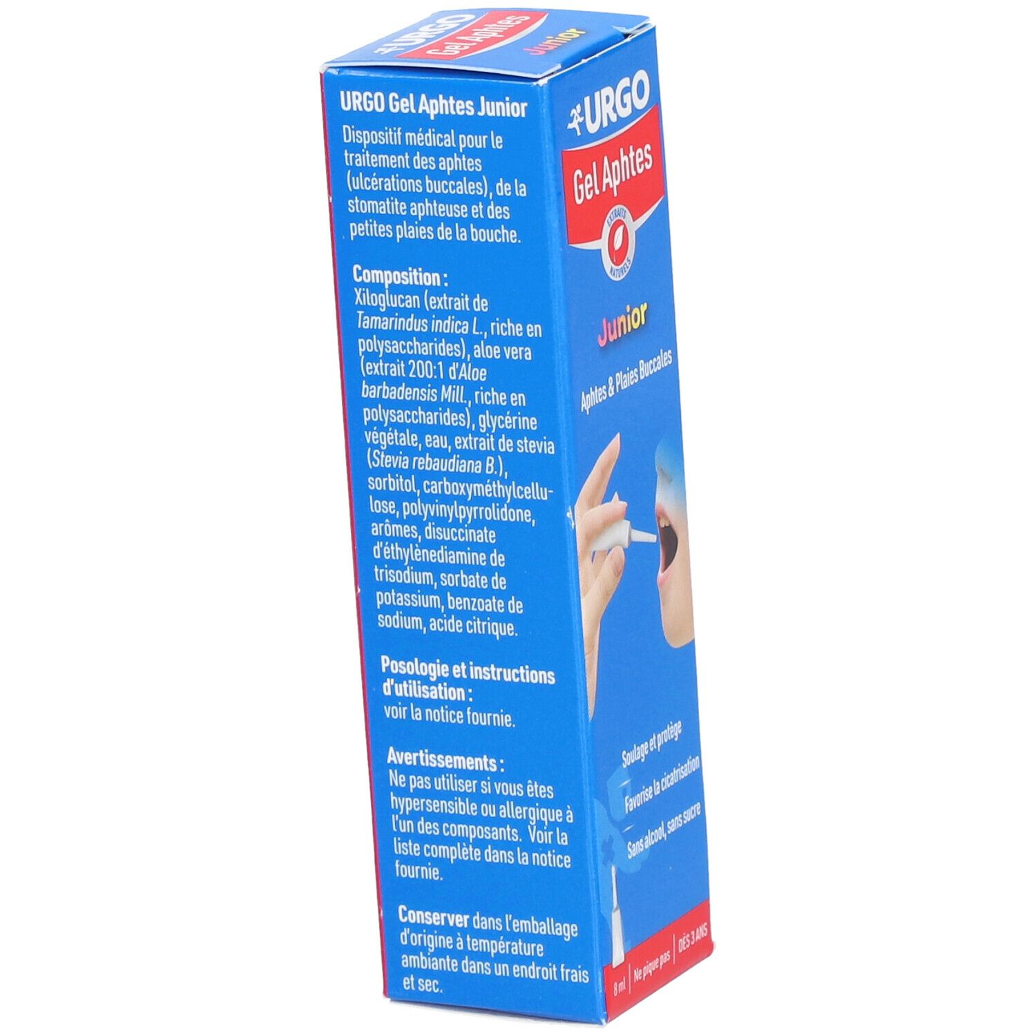 Boîte bleue avec informations produit. Texte : URGO Gel Aphtes Junior. Ingrédients, instructions d'utilisation. Dispositif médical.