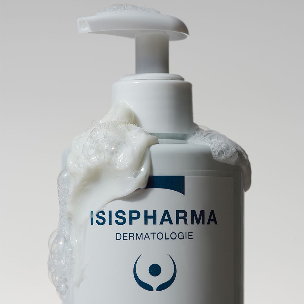 Weiße Flasche mit Pumpe und Schaum. Aufschrift: ISISPHARMA, Dermatologie.