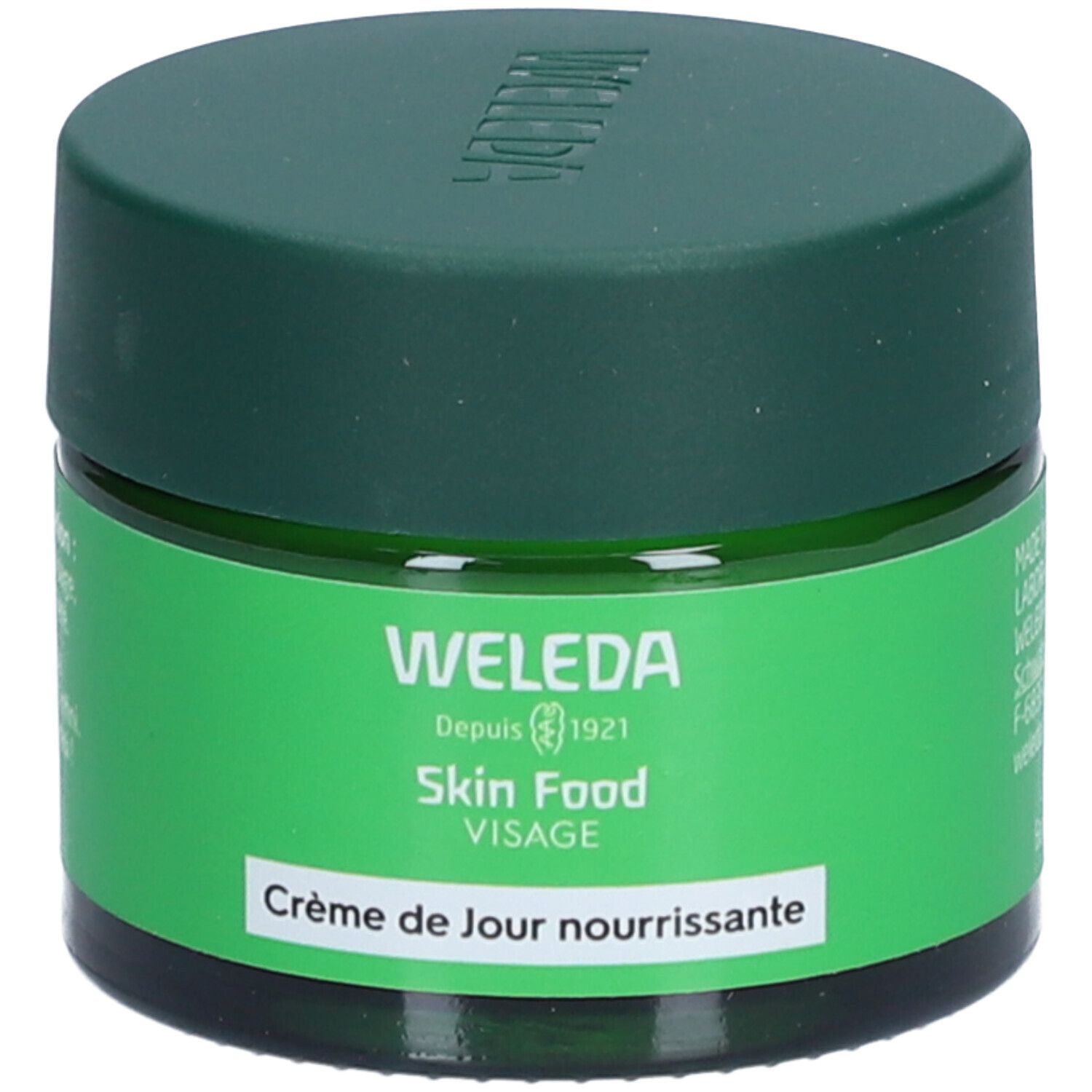 Pot vert avec couvercle vert. Inscription: Weleda Skin Food Visage. Crème de Jour nourrissante.