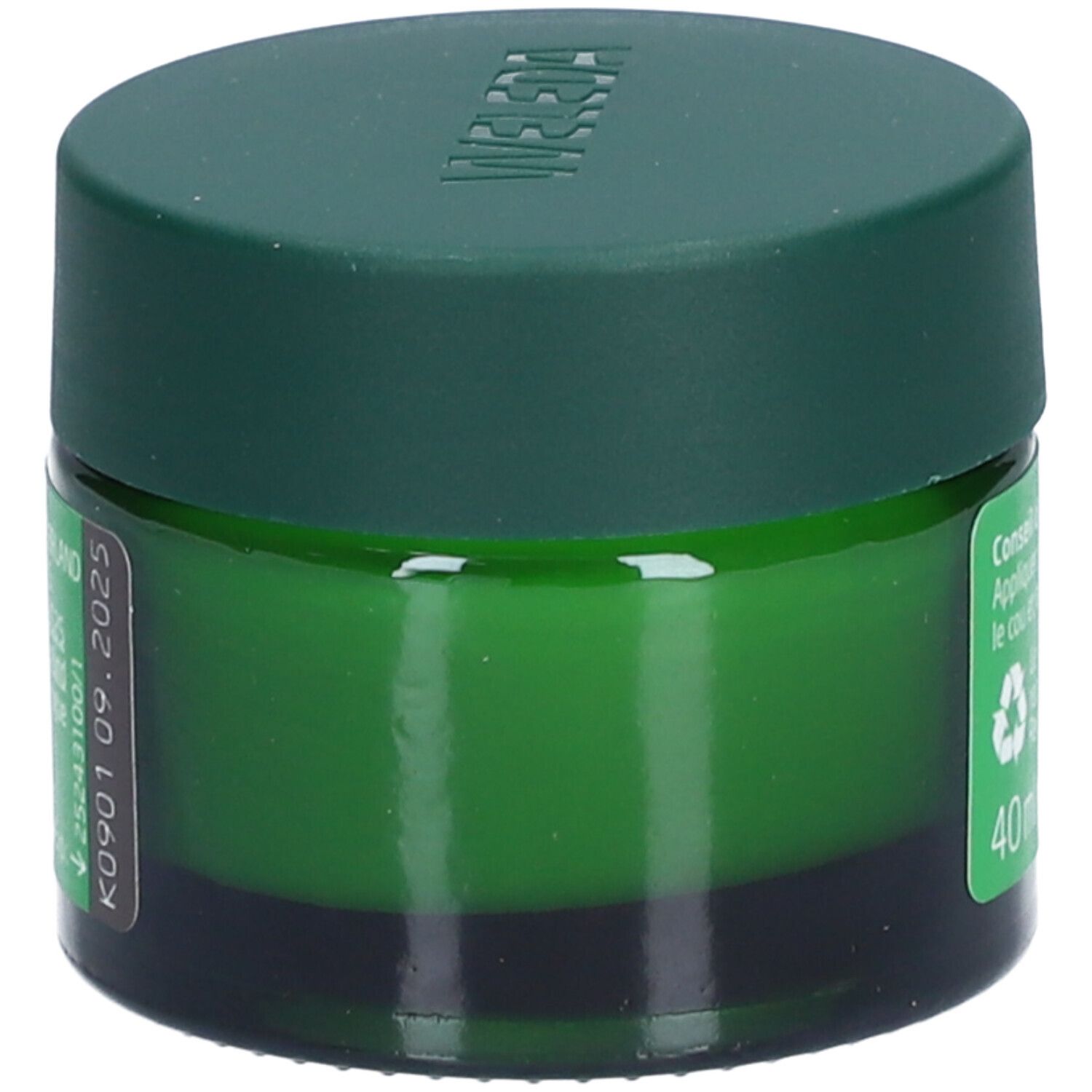 Pot vert avec couvercle vert. Inscription: Weleda. Texte sur l'utilisation et le recyclage. 40 ml.