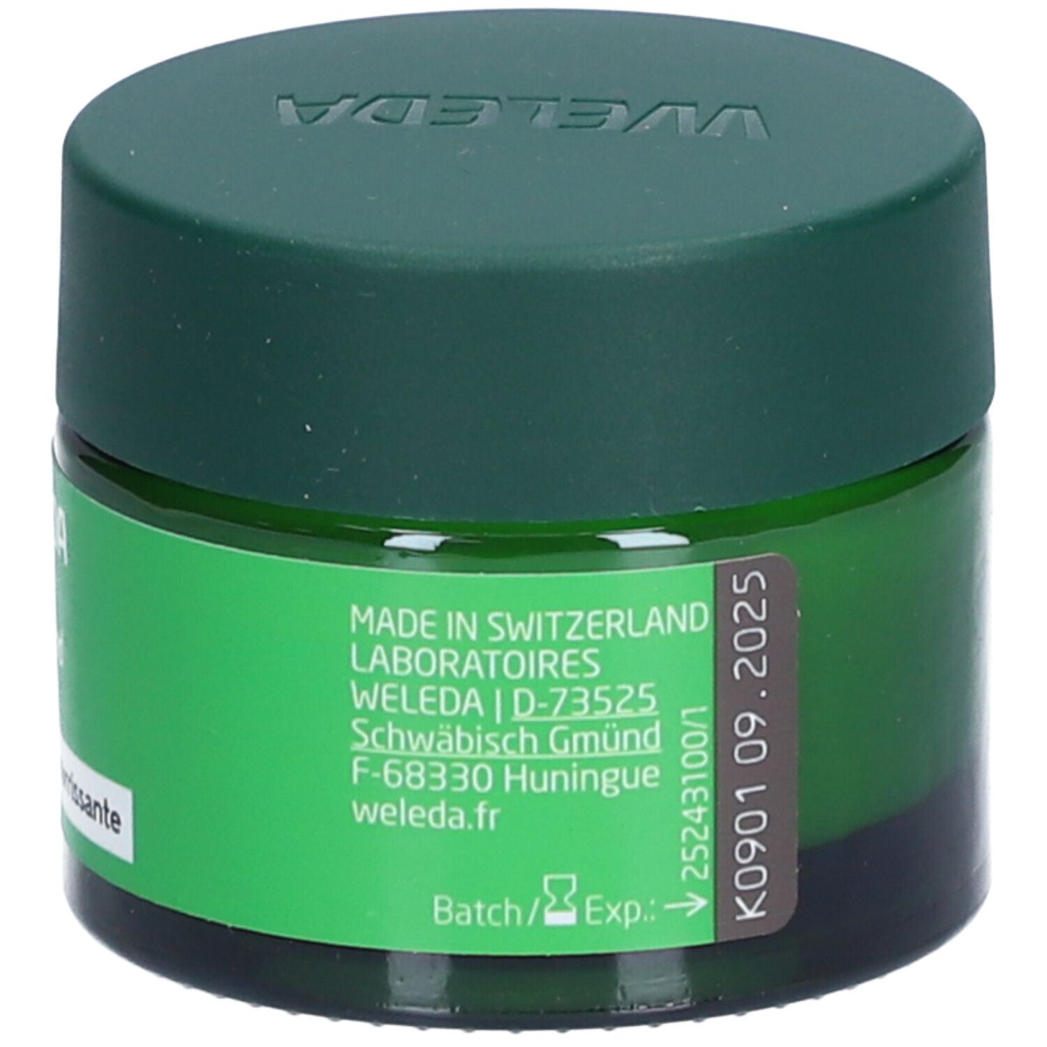 Pot vert avec couvercle vert. Inscription: Weleda. Texte sur l'utilisation et le recyclage. 40 ml.