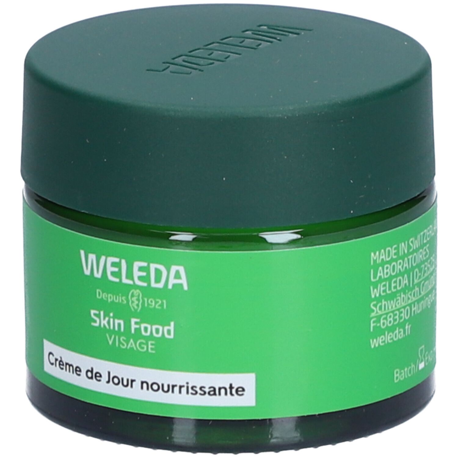 Pot vert avec couvercle vert. Inscription: Weleda. Texte sur l'utilisation et le recyclage. 40 ml.