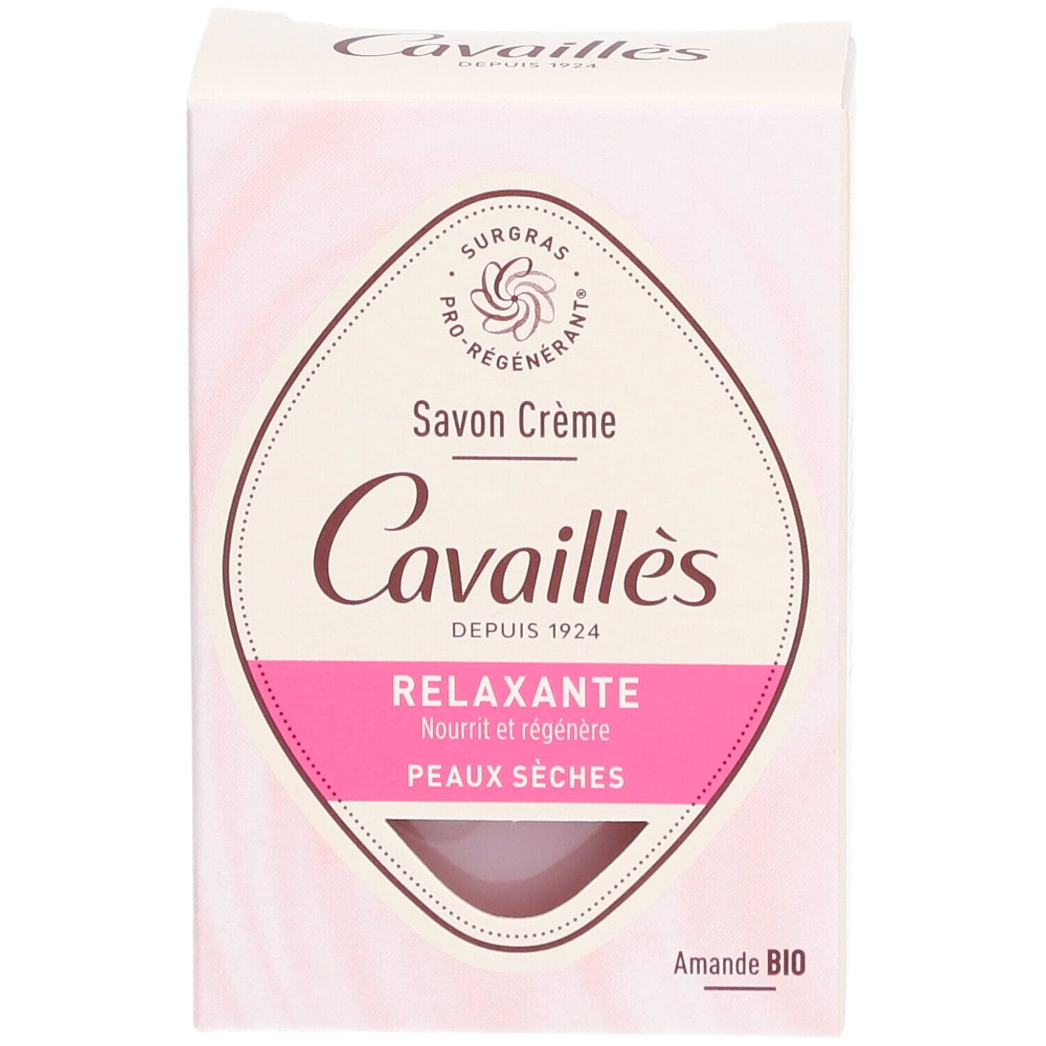 Boîte de savon crème. Design rose et blanc avec nom et logo du produit. Texte: Relaxante, Peaux sèches.