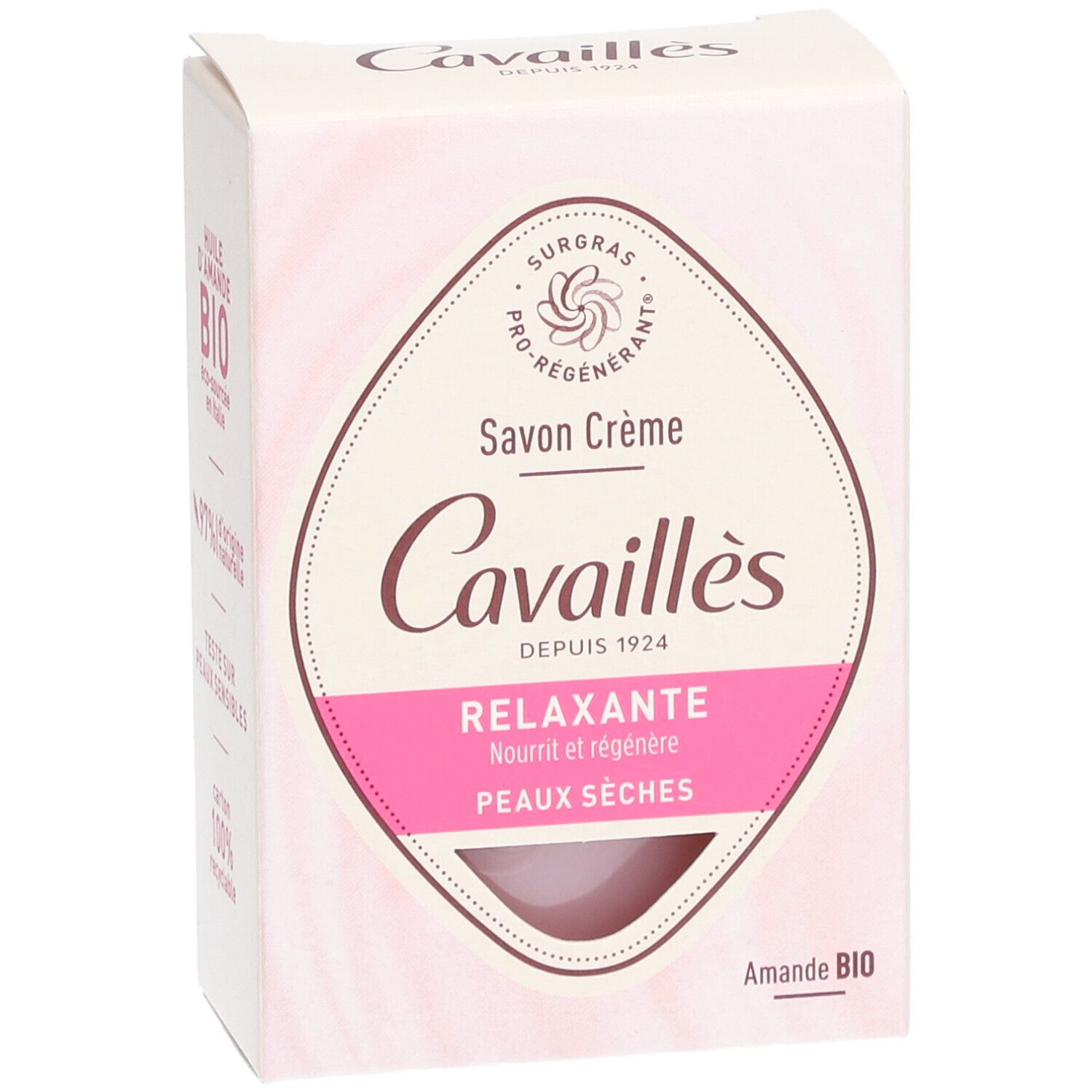 Boîte de savon crème. Design rose et blanc avec nom et logo du produit. Texte: Relaxante, Peaux sèches.