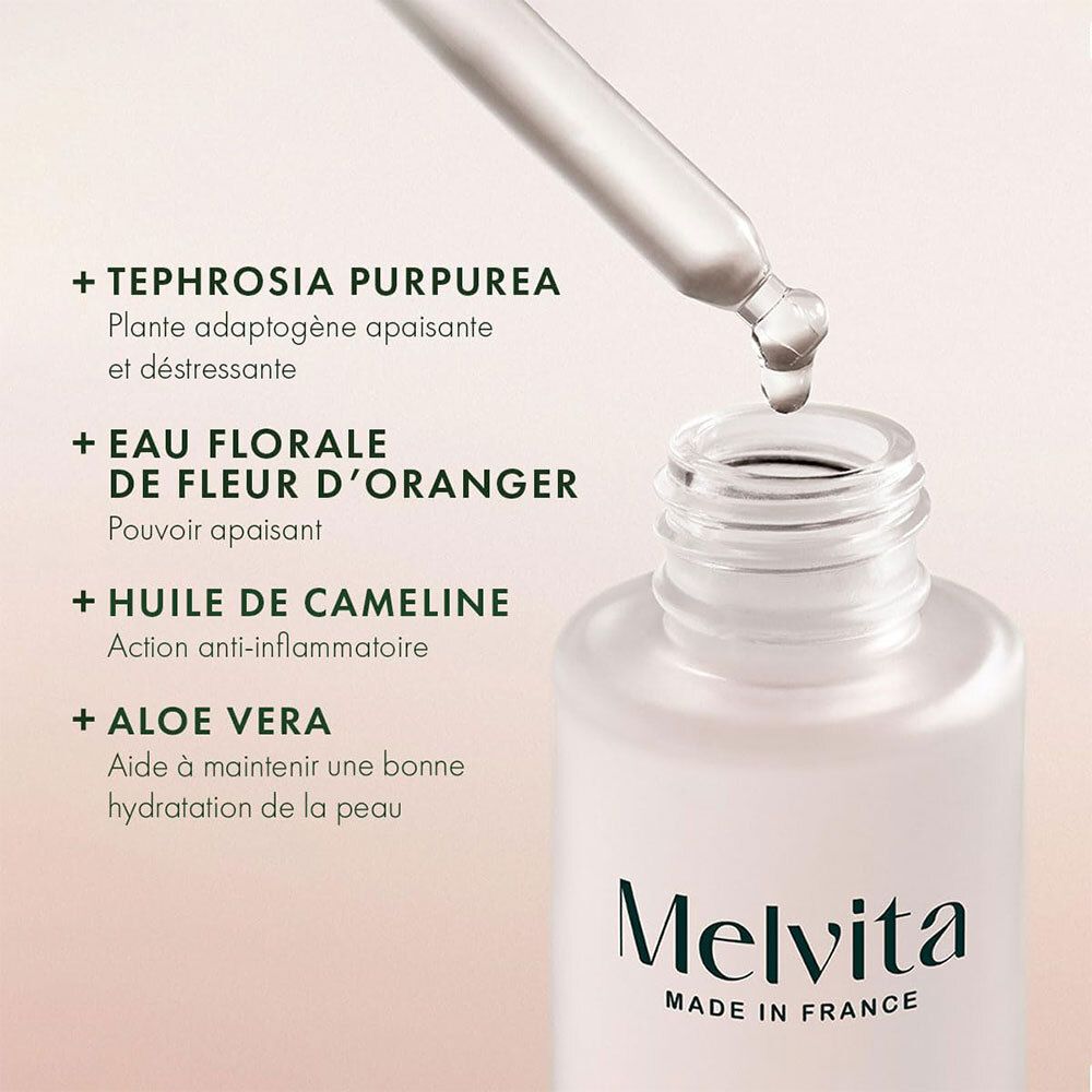 Pipette mit Serum über Melvita NectarCalm Flasche. Inhaltsstoffe auf Französisch.