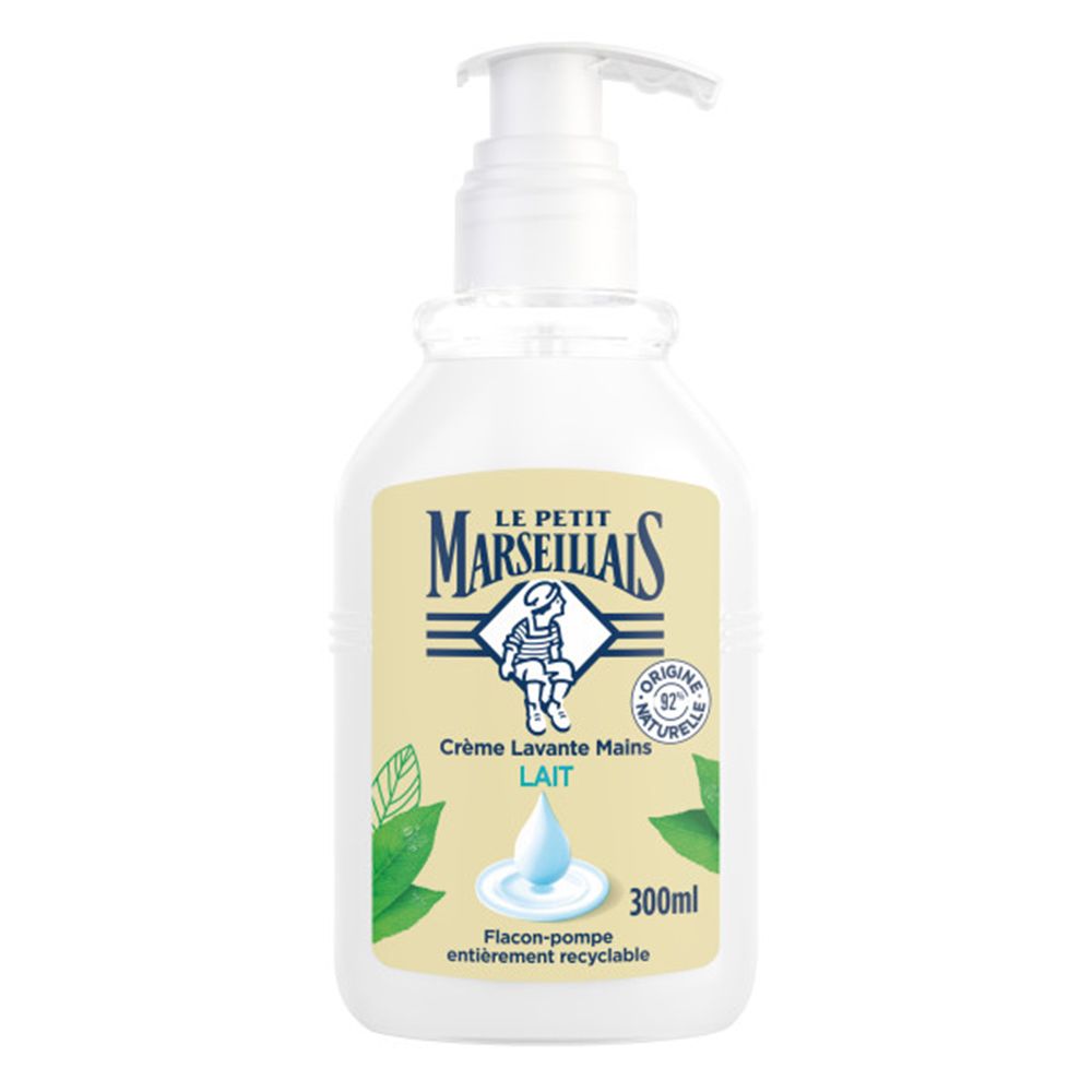 Witte fles Le Petit Marseillais Crème Lavante Mains Lait. Met pomp en groene bladeren. 300ml.