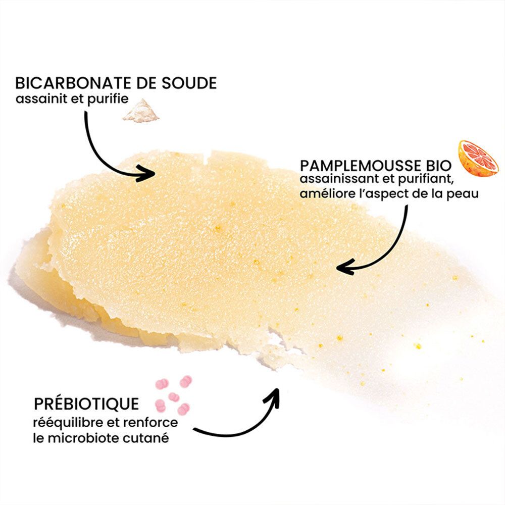 Nahaufnahme von Inhaltsstoffen. Pfeile zeigen auf Bicarbonate de soude, Pamplemousse Bio und Prébiotique.