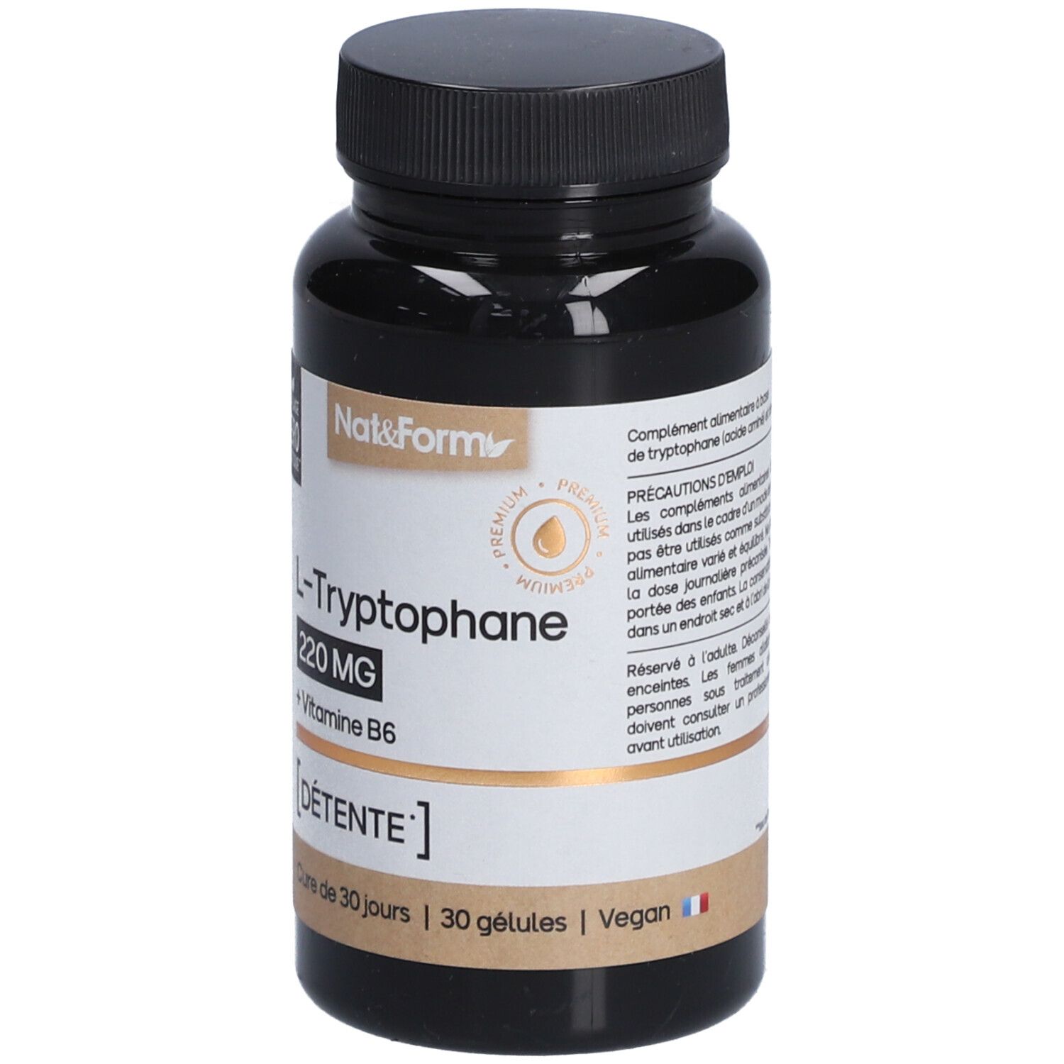 Flacon marron avec bouchon noir. Inscription: L-Tryptophane 220 MG + Vitamine B6. 30 gélules. Vegan.