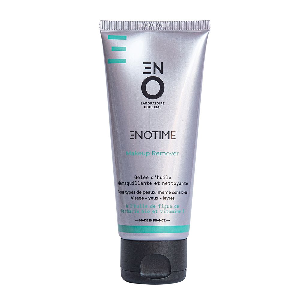 Tube argenté, bouchon noir. Inscription Enotime Makeup Remover. Accents turquoise. Informations produit en français.