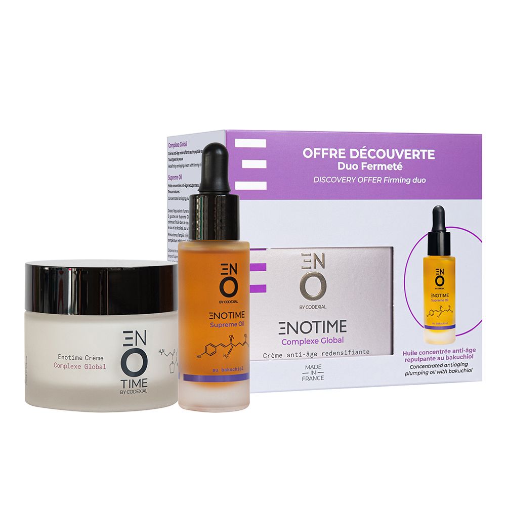 Coffret avec crème, huile et flacon. Texte: Offre Découverte Duo Fermeté. Crème: Complexe Global. Huile: Supreme Oil. Flacon pipette.