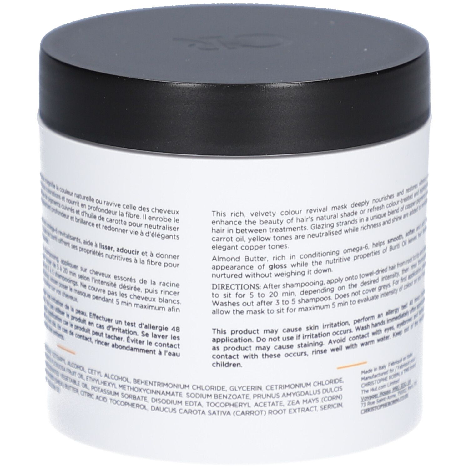 Weißes Tiegel mit schwarzem Deckel. Text auf der Seite.