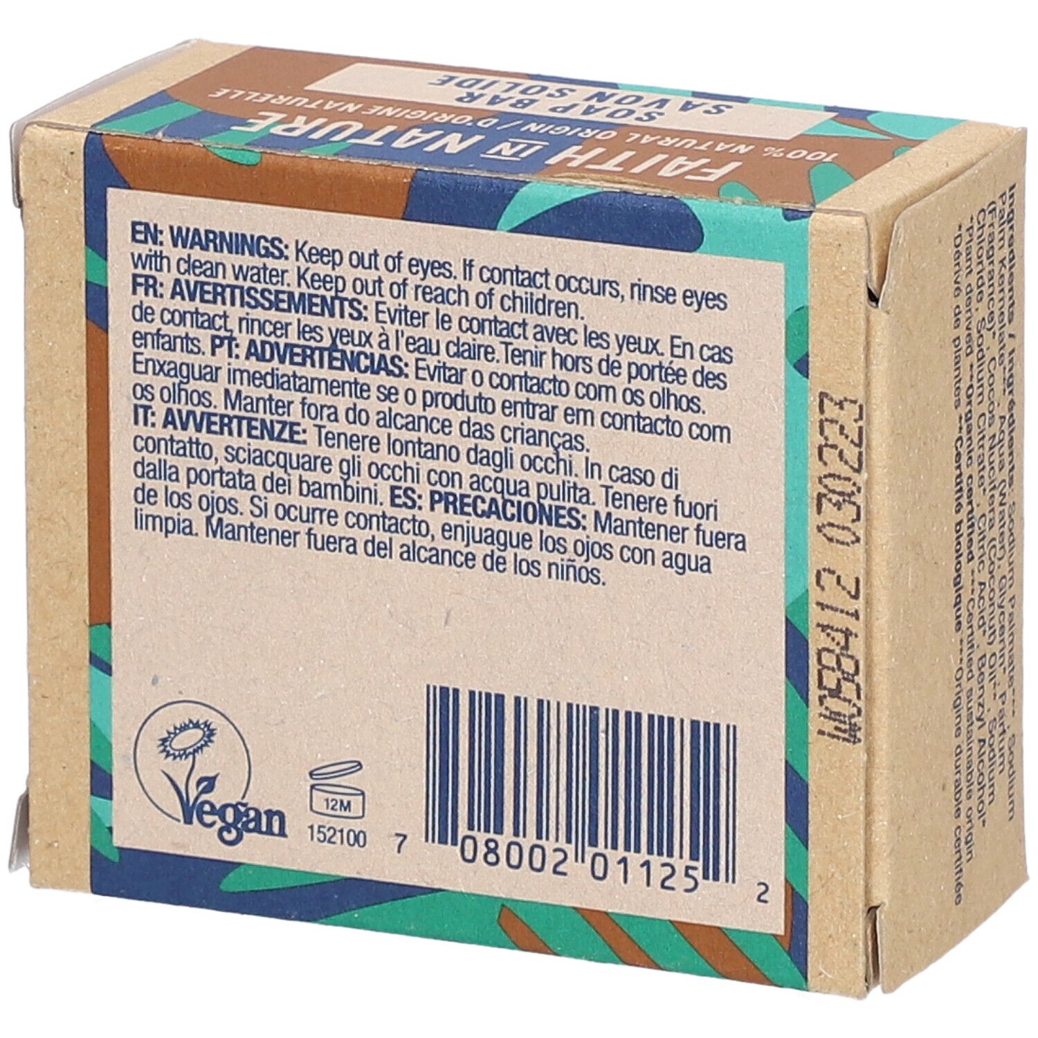 Kartonverpackung mit Warnhinweisen in mehreren Sprachen. Vegan-Logo. Barcode.