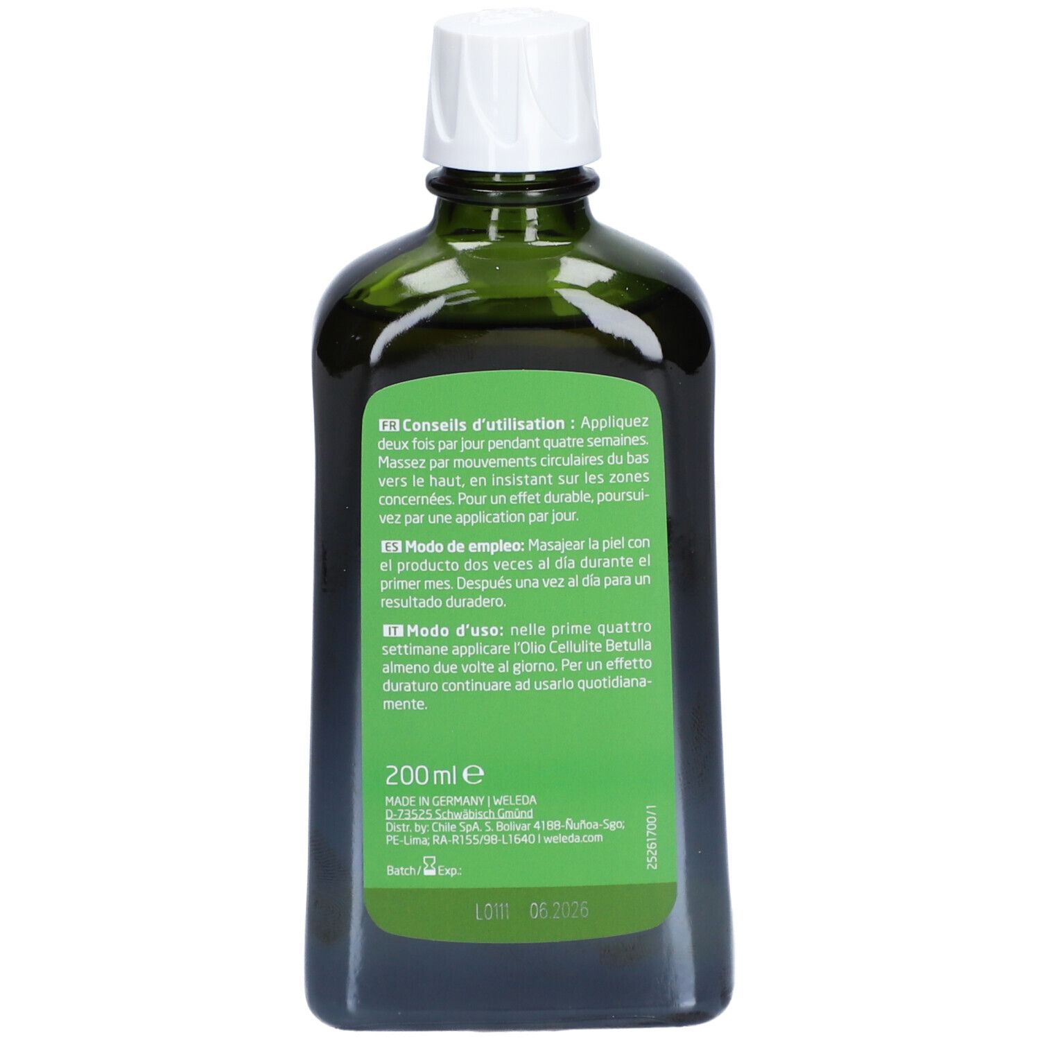 Rückseite der grünen Glasflasche. Text in mehreren Sprachen. Produktinformationen, Herstelleradresse und Chargennummer.