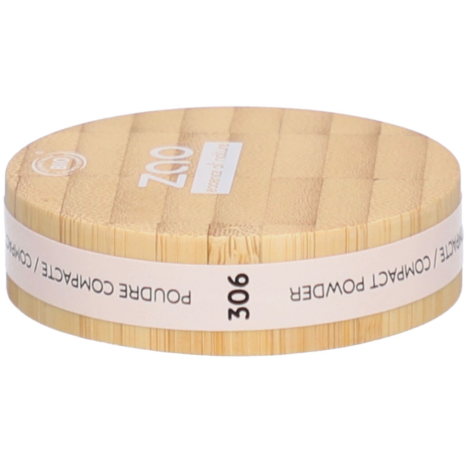 Ronde compactpoederdoos van hout. Opschrift: ZAO, essence of nature, 306, Poudre Compacte / Compact Powder.