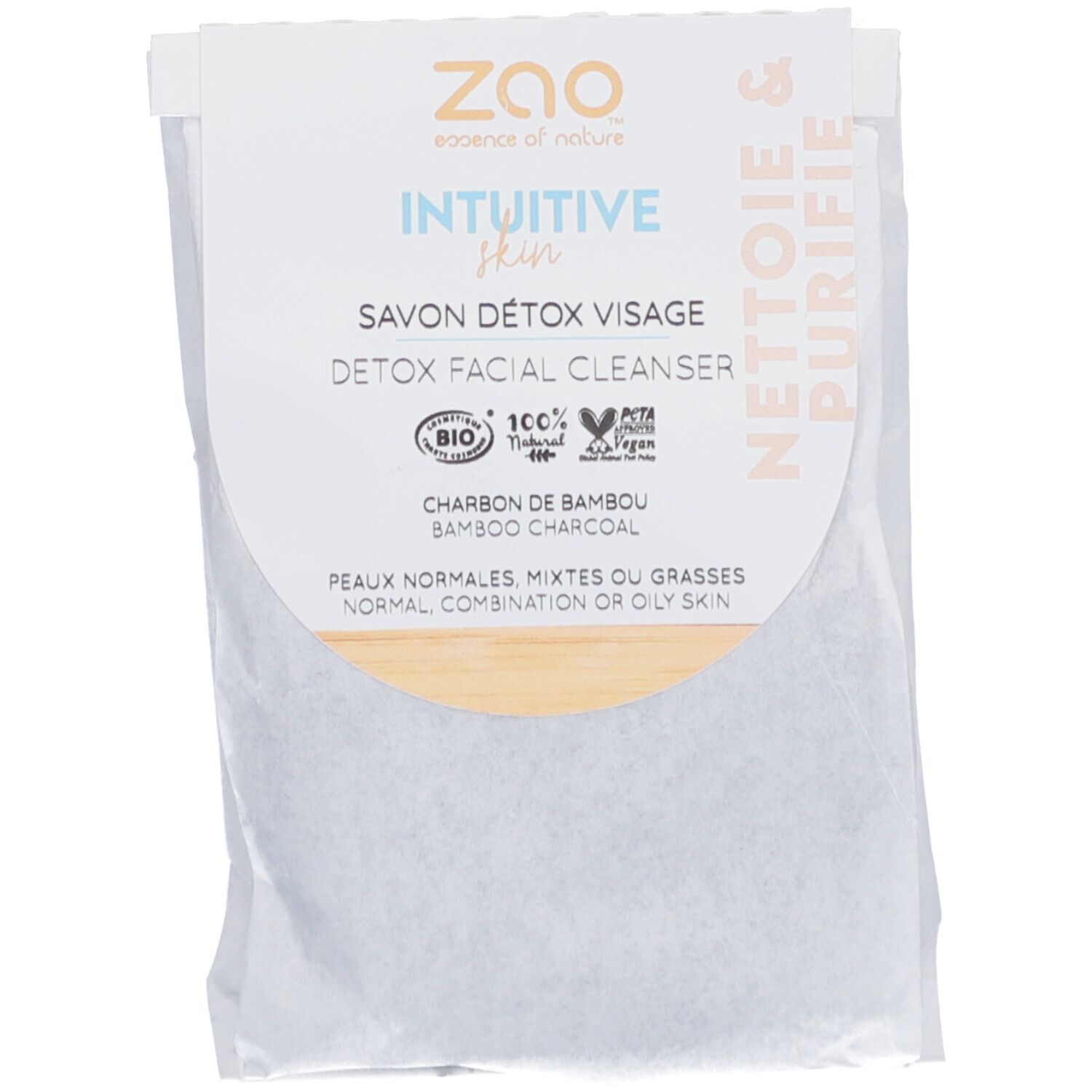 Verpakking met productinformatie. Tekst: "ZAO", "Detox Facial Cleanser", "Bamboo Charcoal". Bio- en vegan keurmerk.