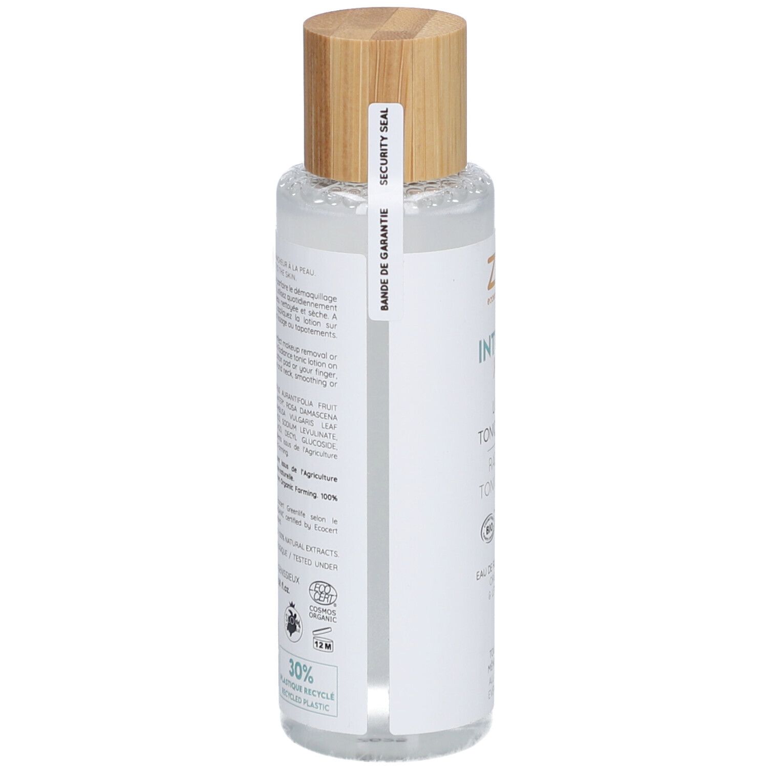 Transparante fles met houten dop. Opschriften en ingrediënten op etiket. Bio-certificering. Veiligheidszegel.