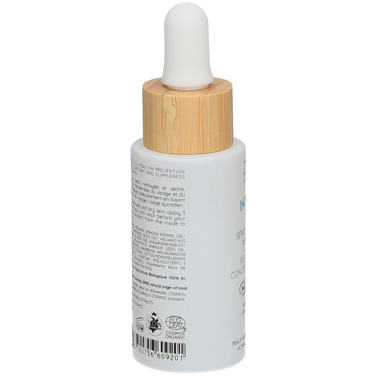 Wit serumflesje met houten dop en pipet. Achterkant met tekst en certificeringen. Opschrift: ZAO.