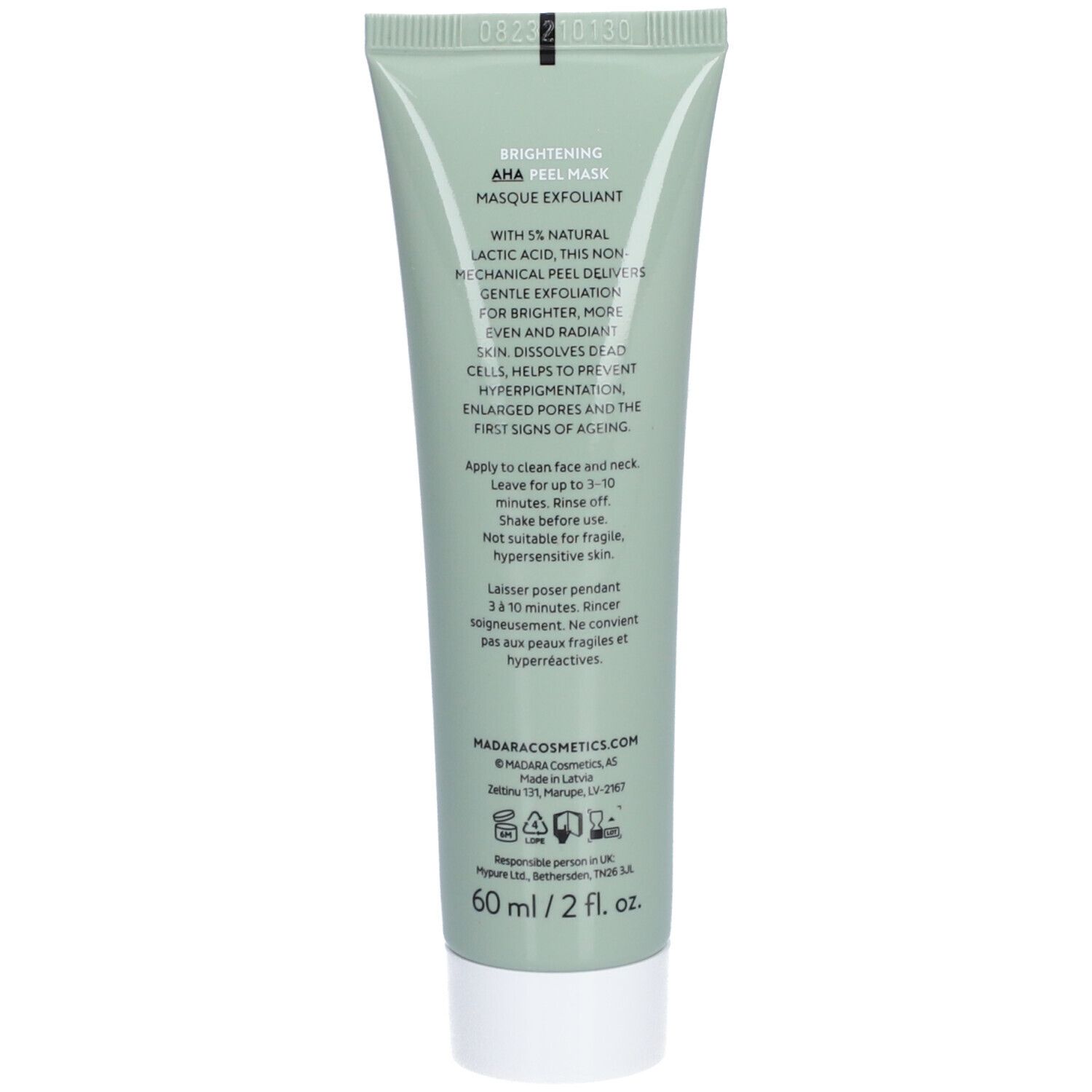Rückseite einer grünen Tube. Text: Brightening AHA Peel Mask, Inhaltsstoffe, Anwendungshinweise, Kontaktinformationen.