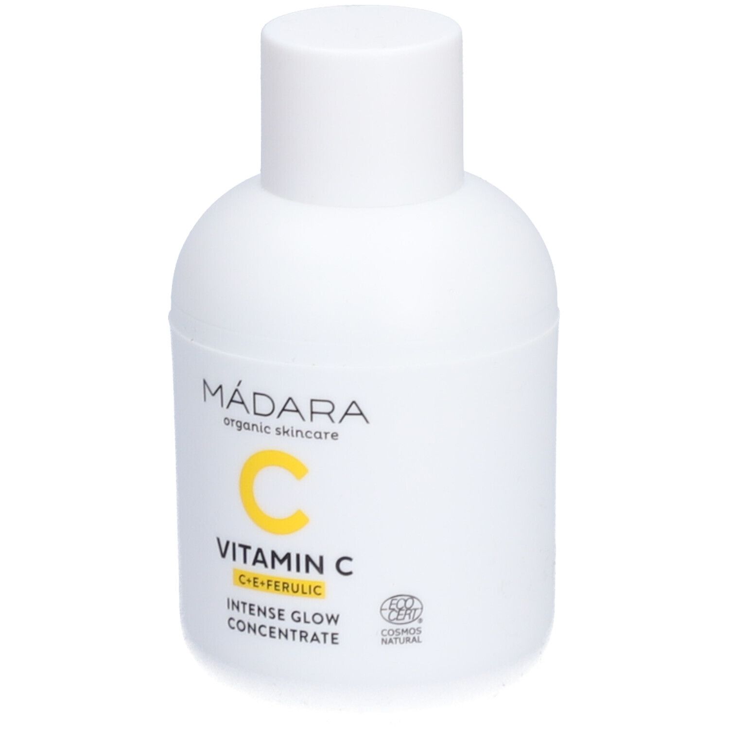 Weiße Flasche mit gelbem Aufdruck. Aufschrift: Mádara, Vitamin C, Intense Glow Concentrate. COSmos Natural-Zertifizierung.