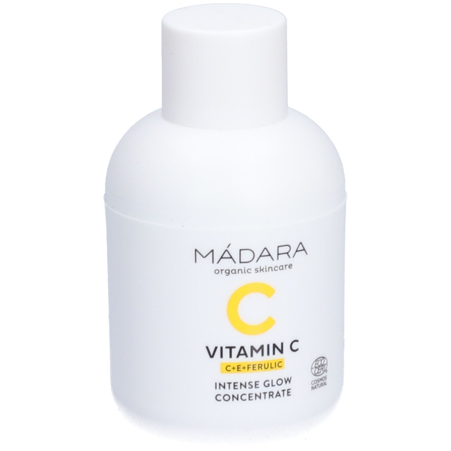 Weiße Flasche mit gelbem Aufdruck. Aufschrift: Mádara, Vitamin C, Intense Glow Concentrate. COSmos Natural-Zertifizierung.