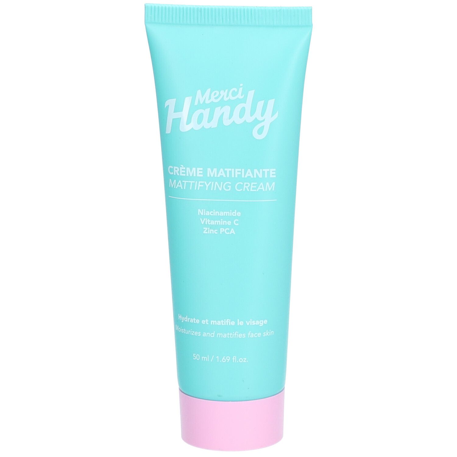 Turquoise tube met roze dop. Witte tekst "Merci Handy" en "Crème Matifiante". Bevat Niacinamide, Vitamine C, Zink PCA.